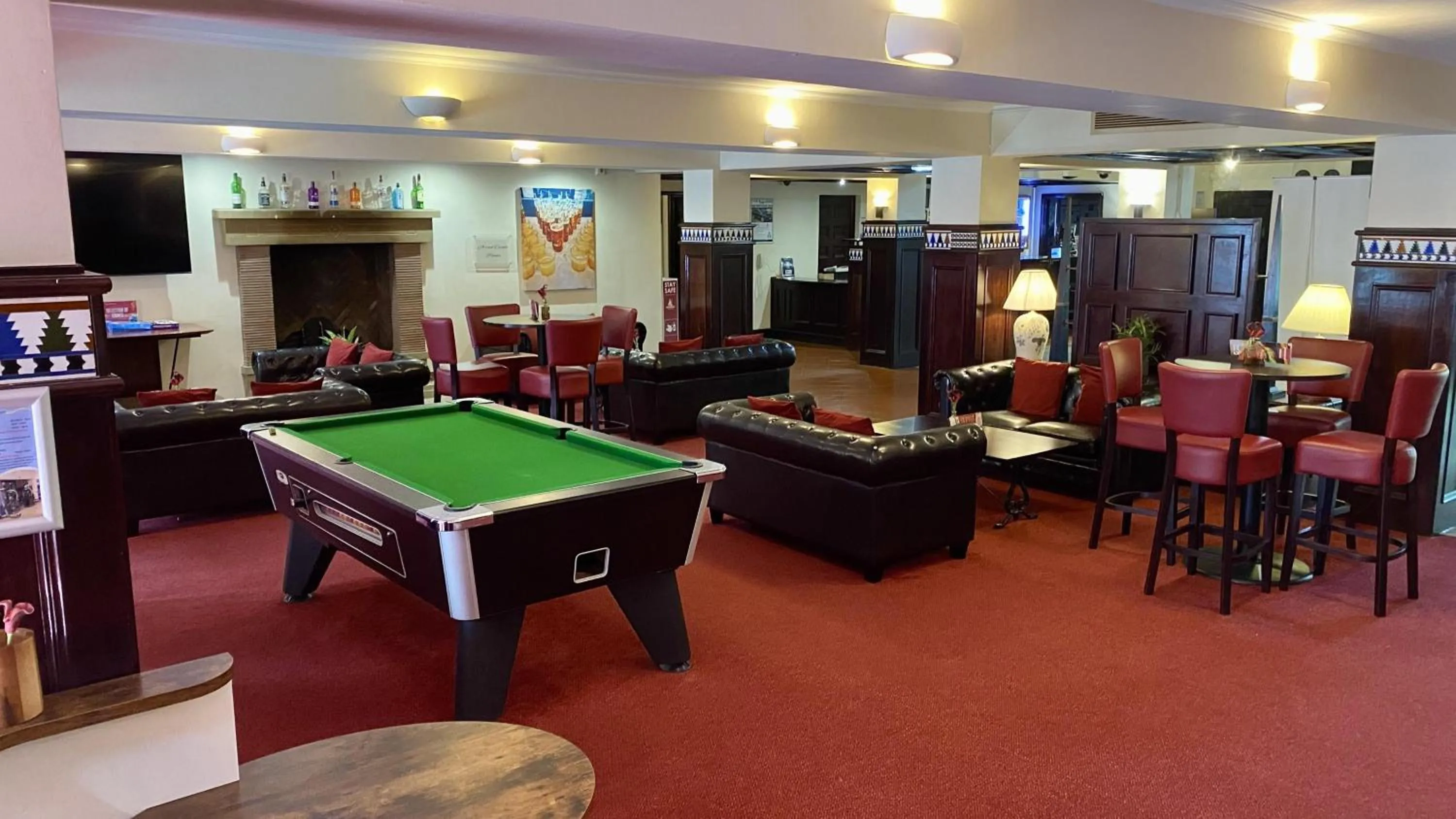 Communal lounge/ TV room in Europa Gatwick Hotel