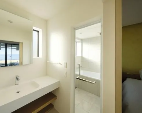 Bed in そらすな Beach Side Resort Hotel