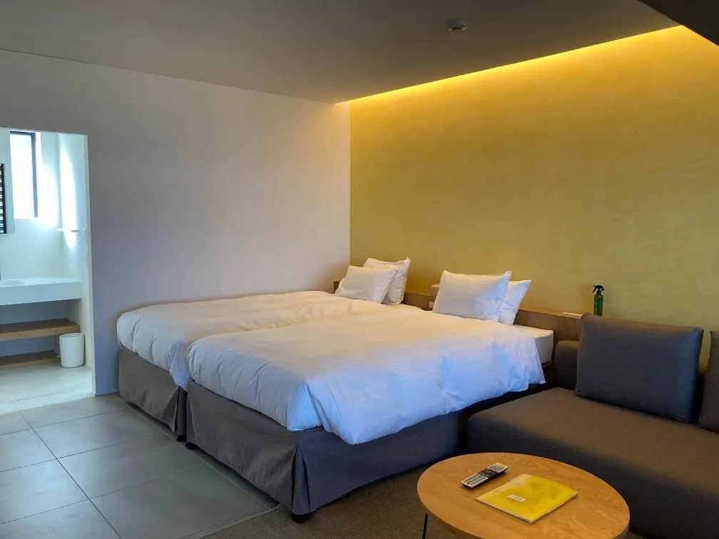 Bed in そらすな Beach Side Resort Hotel