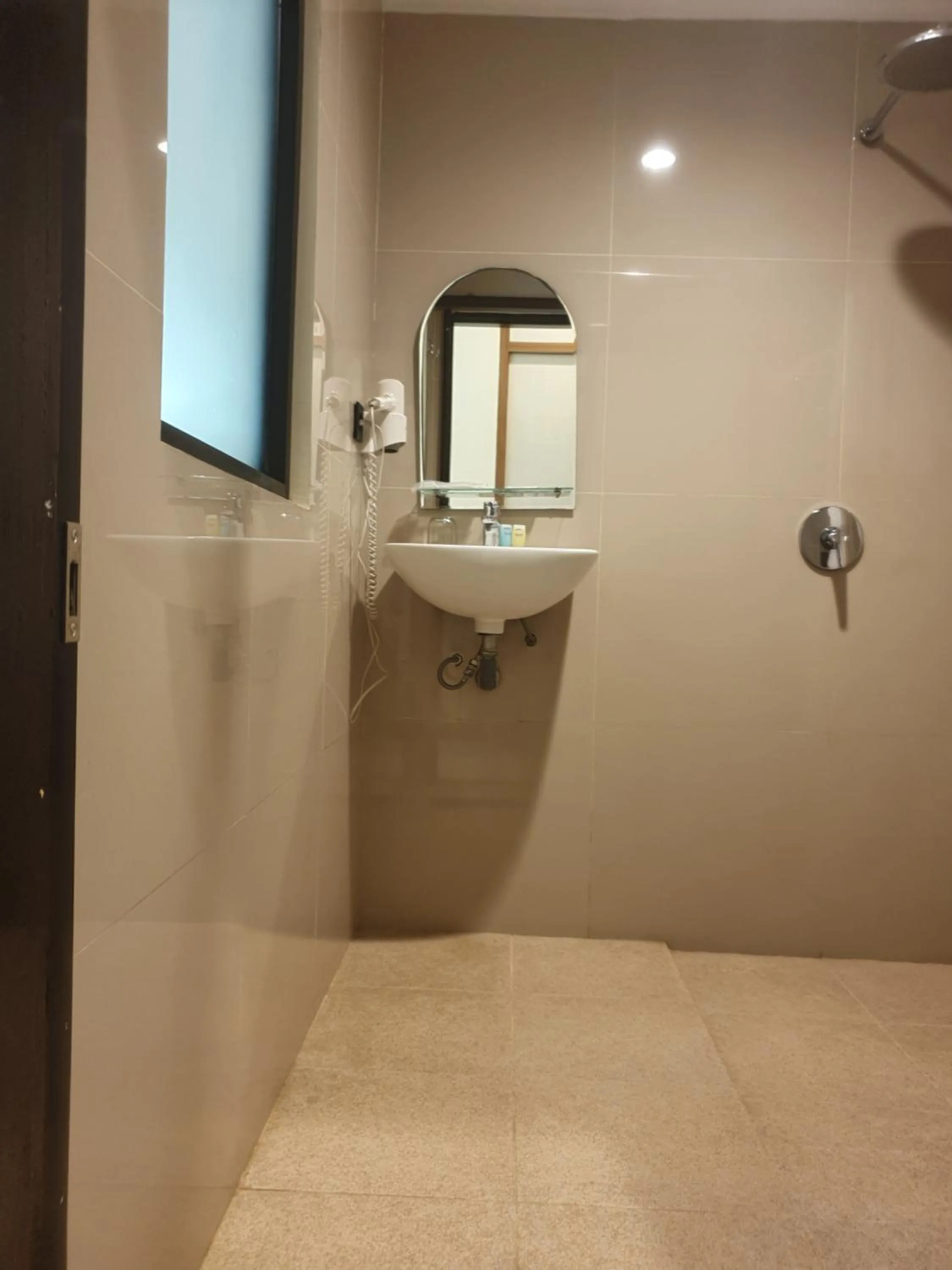 Bathroom in Violand Garden Hotel Samarinda