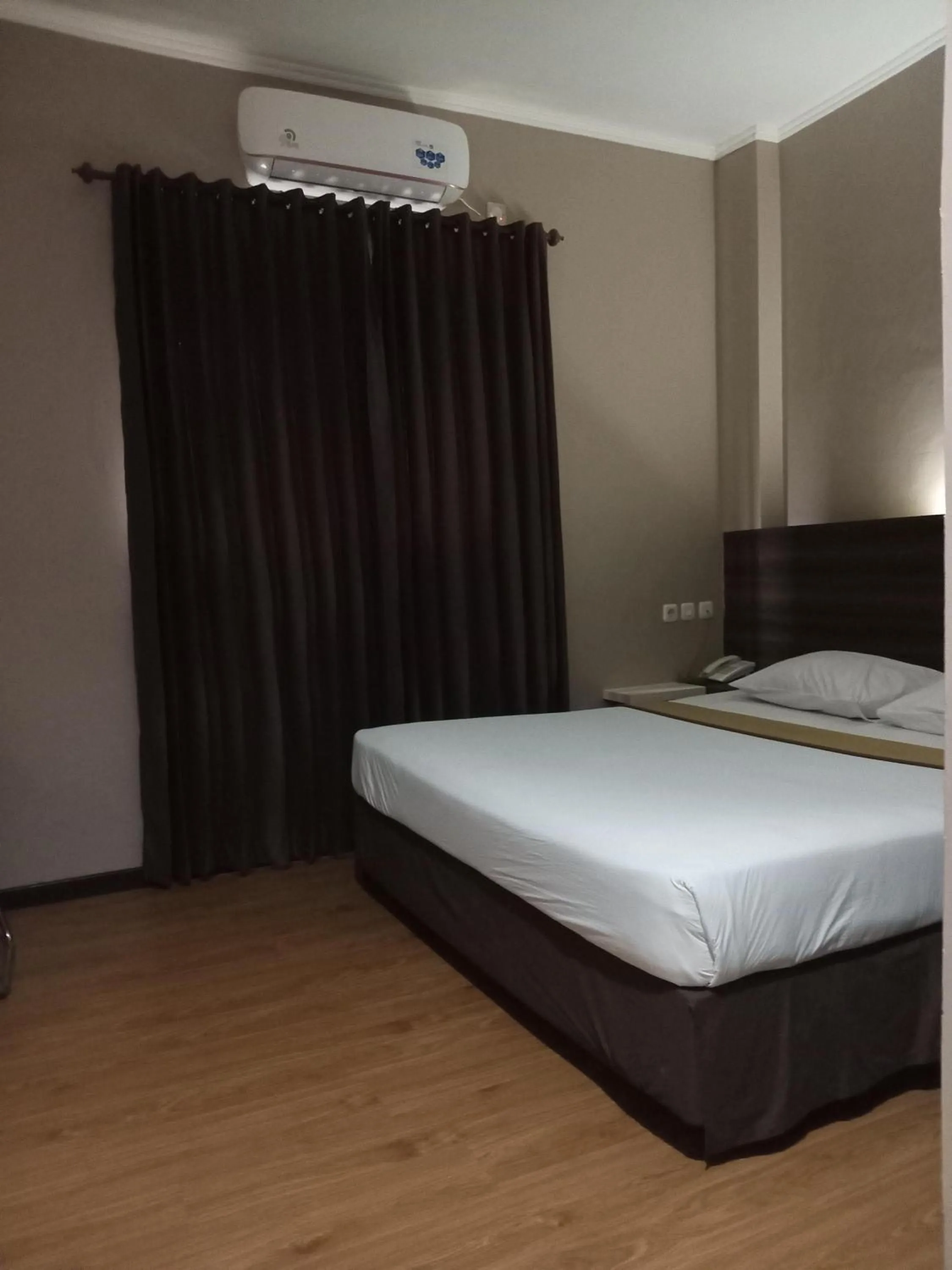 Bed in Violand Garden Hotel Samarinda