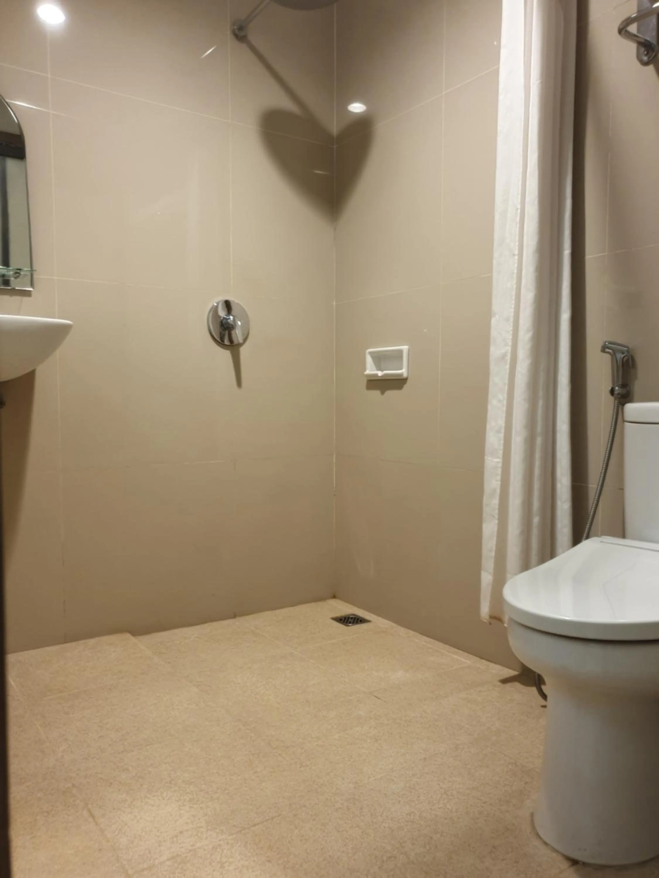 Bathroom in Violand Garden Hotel Samarinda