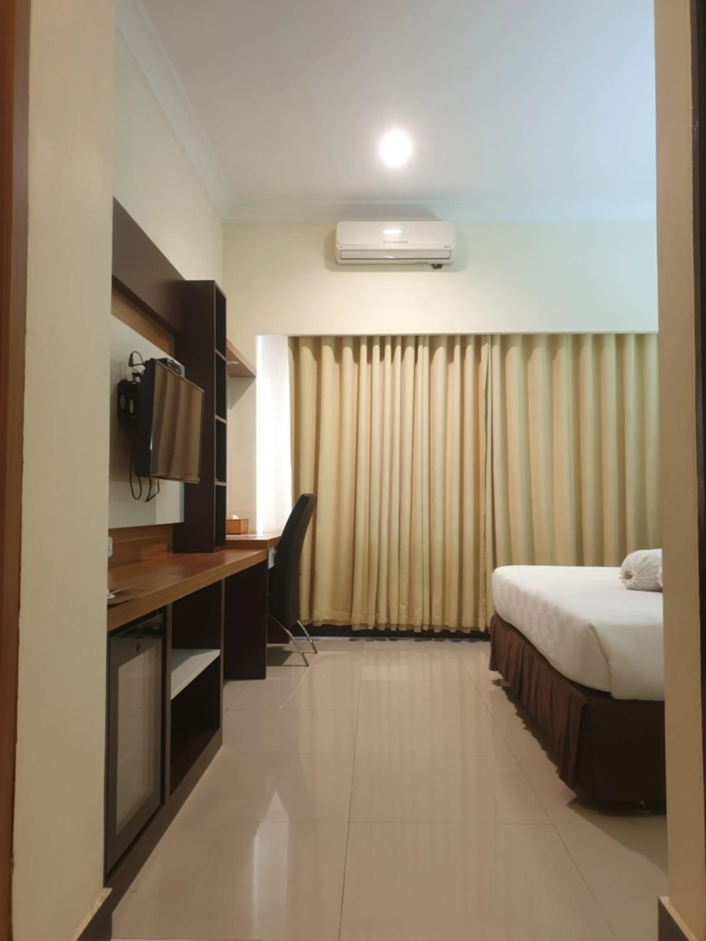 Bed in Violand Garden Hotel Samarinda