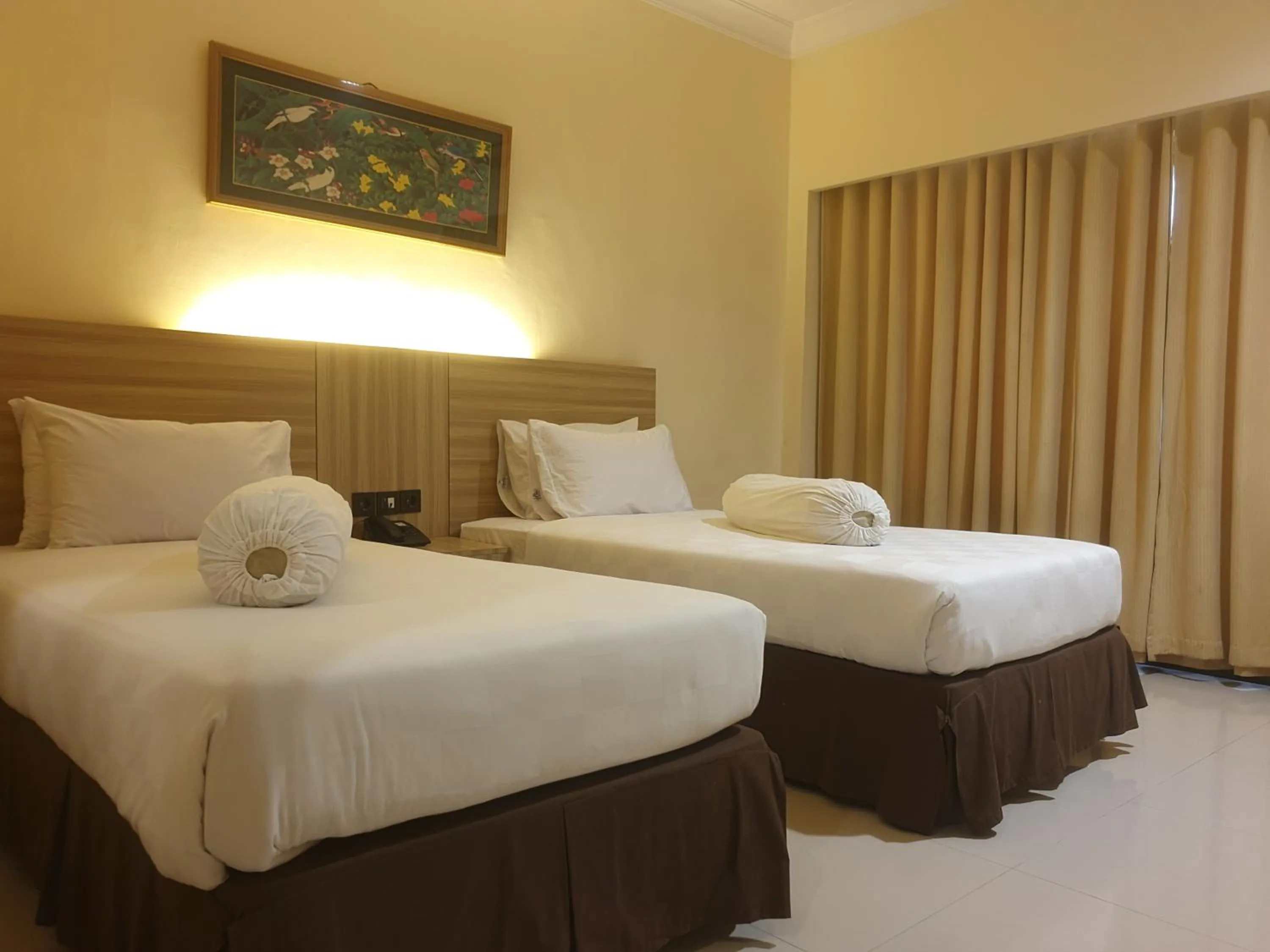Bed in Violand Garden Hotel Samarinda