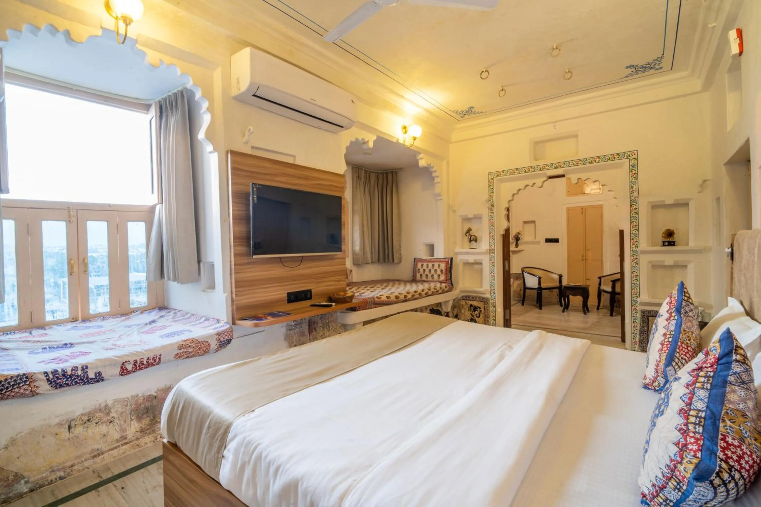 Bed in Amoraya Udaipur