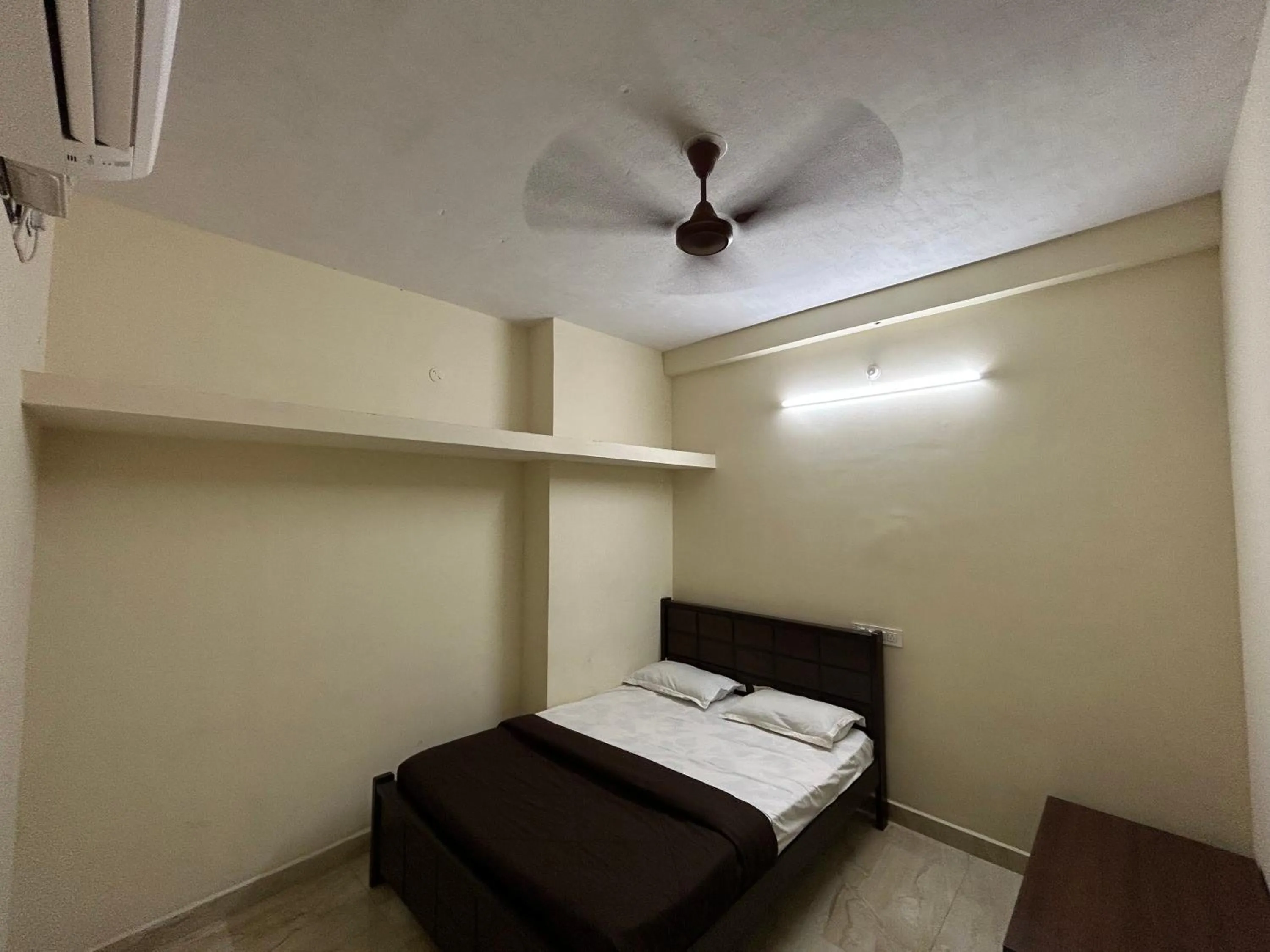 Bed in The kaya homestay Srirangam