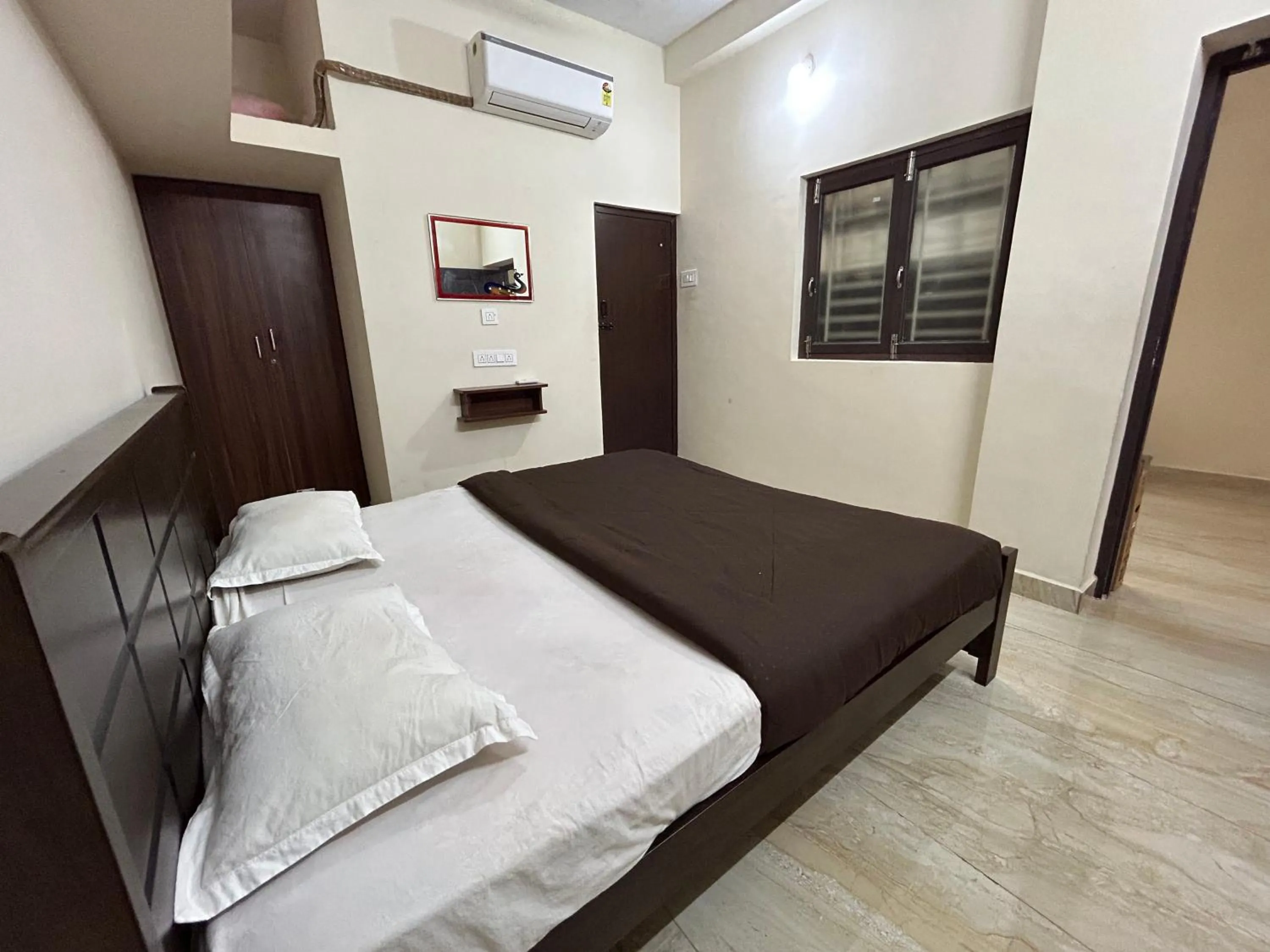 Bed in The kaya homestay Srirangam