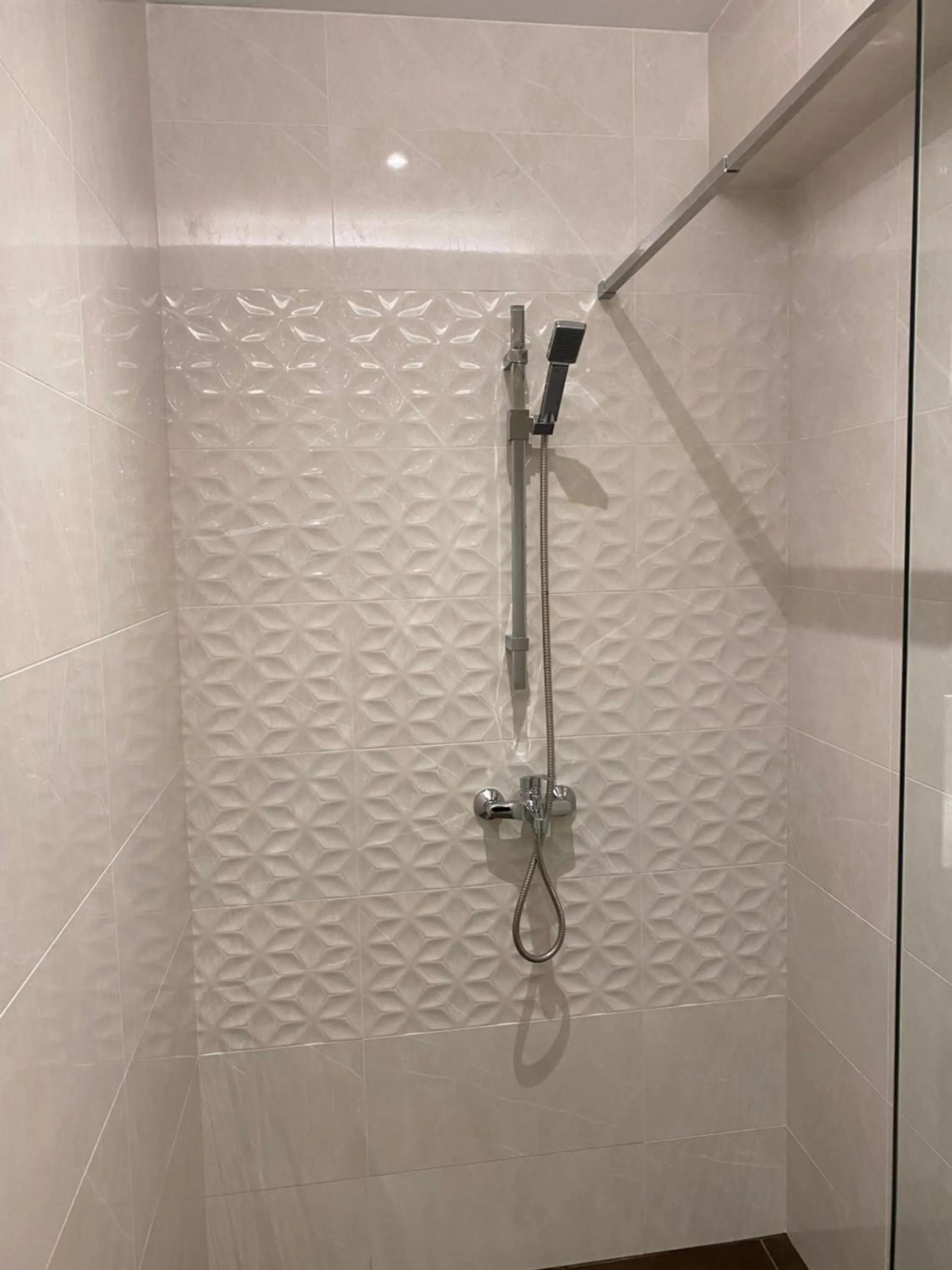Shower in Elena Village Hotel & Suites