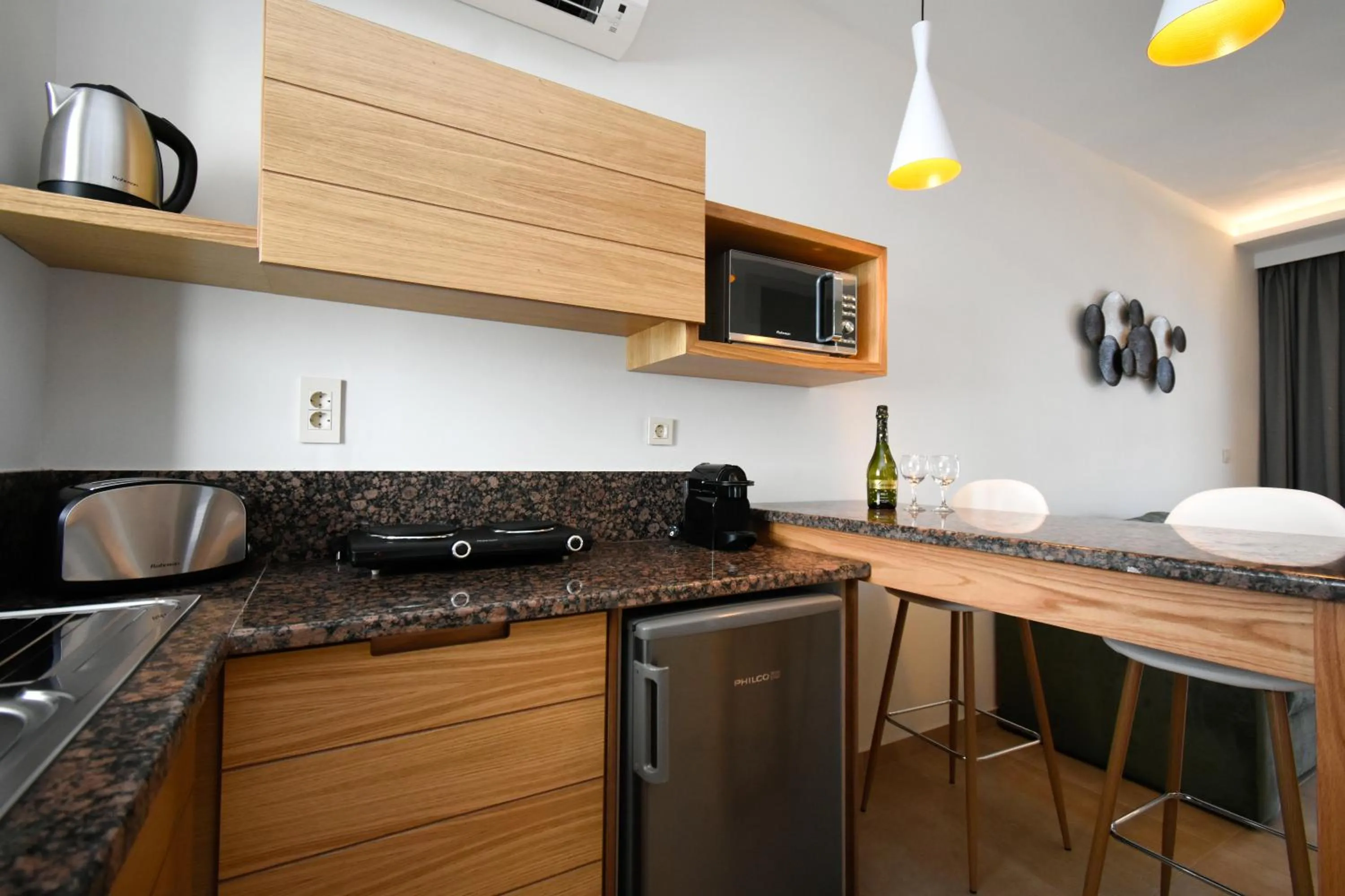 Kitchen or kitchenette in Elena Village Hotel & Suites