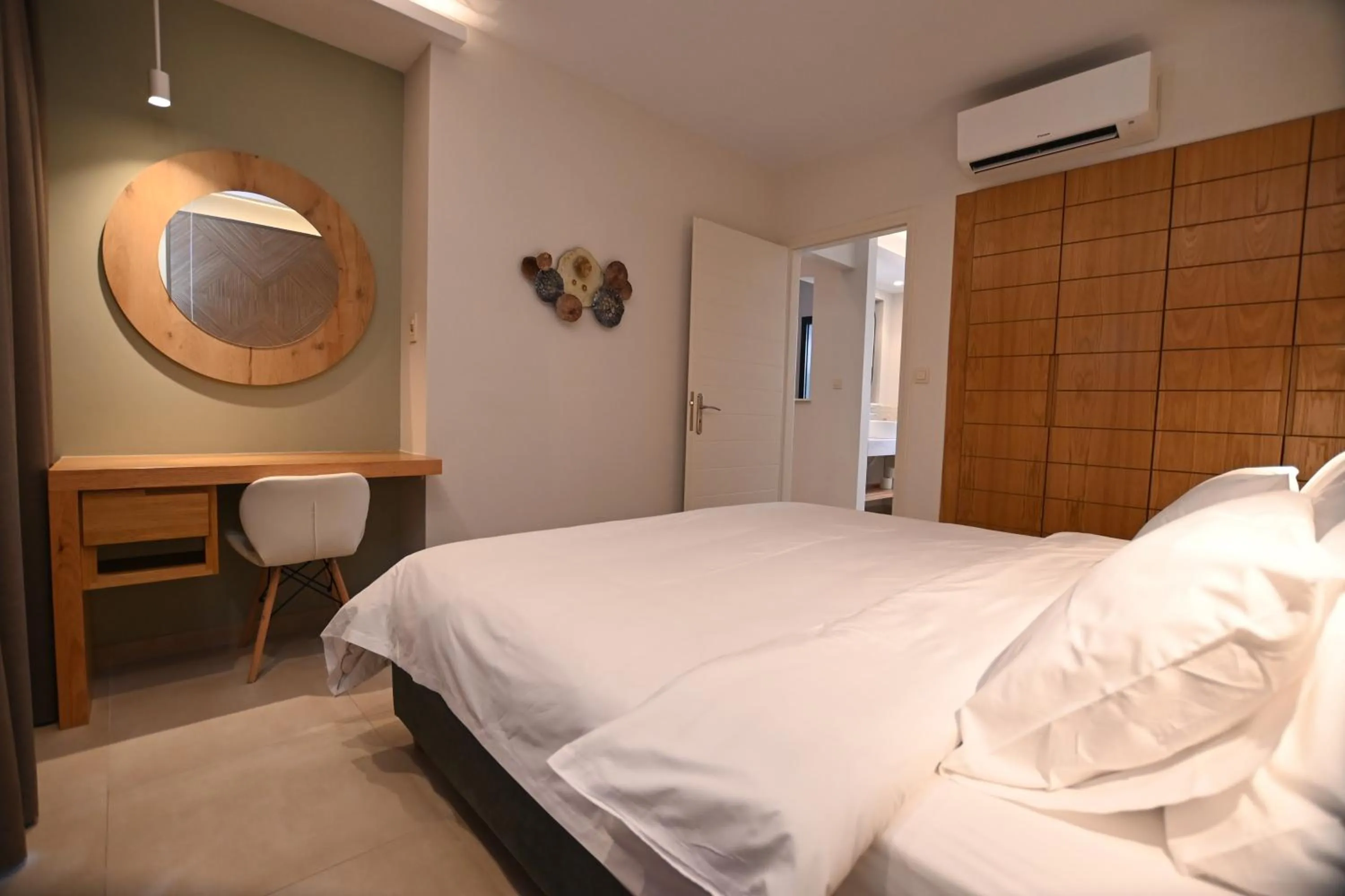 Bed in Elena Village Hotel & Suites