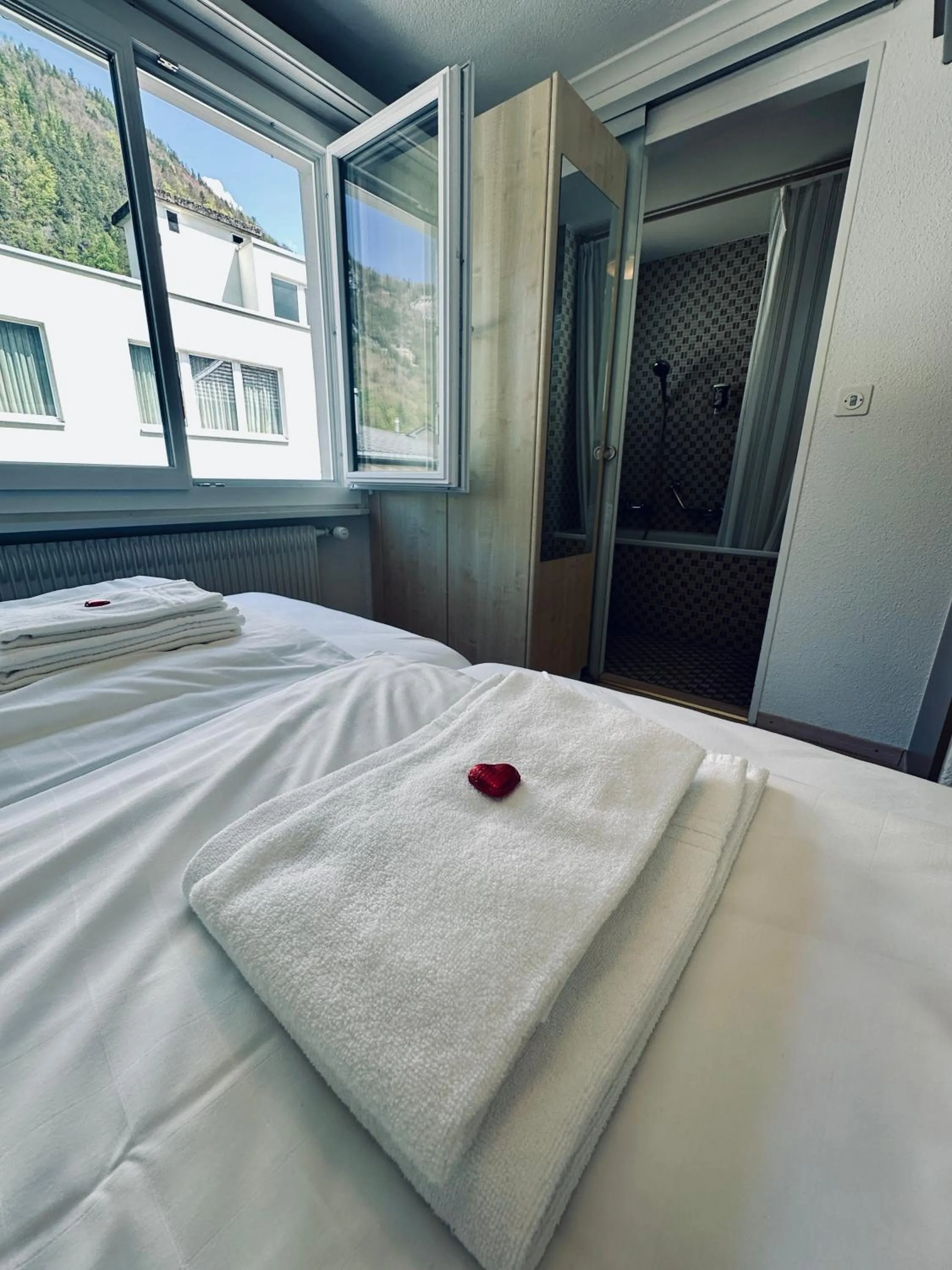 Bed in Hotel Rebstock Meiringen