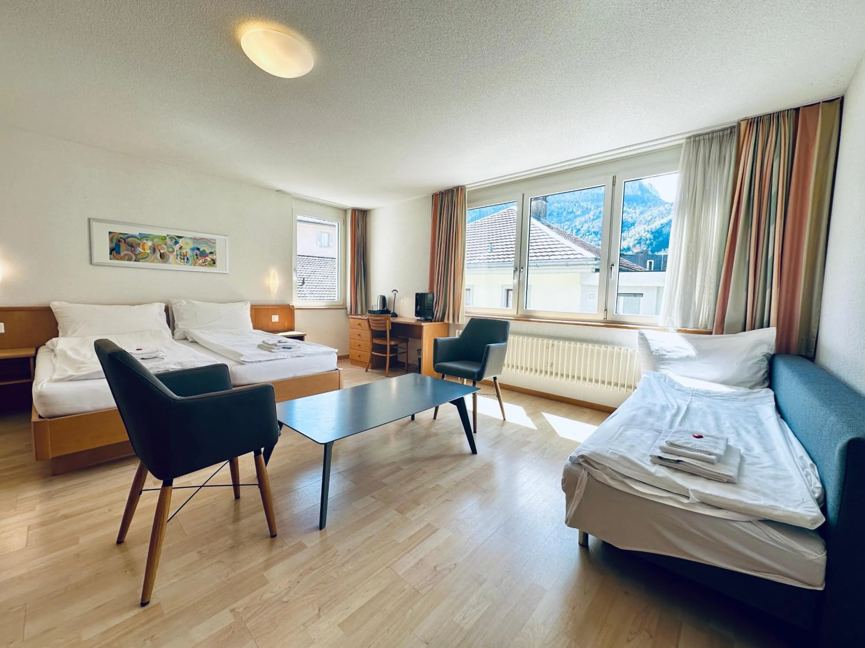 Bed in Hotel Rebstock Meiringen