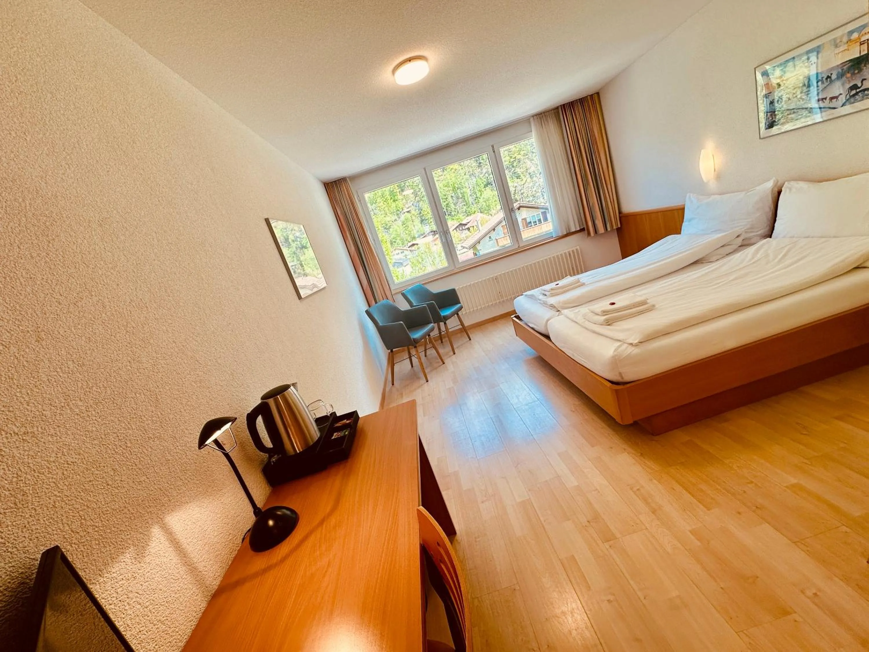 Bed in Hotel Rebstock Meiringen