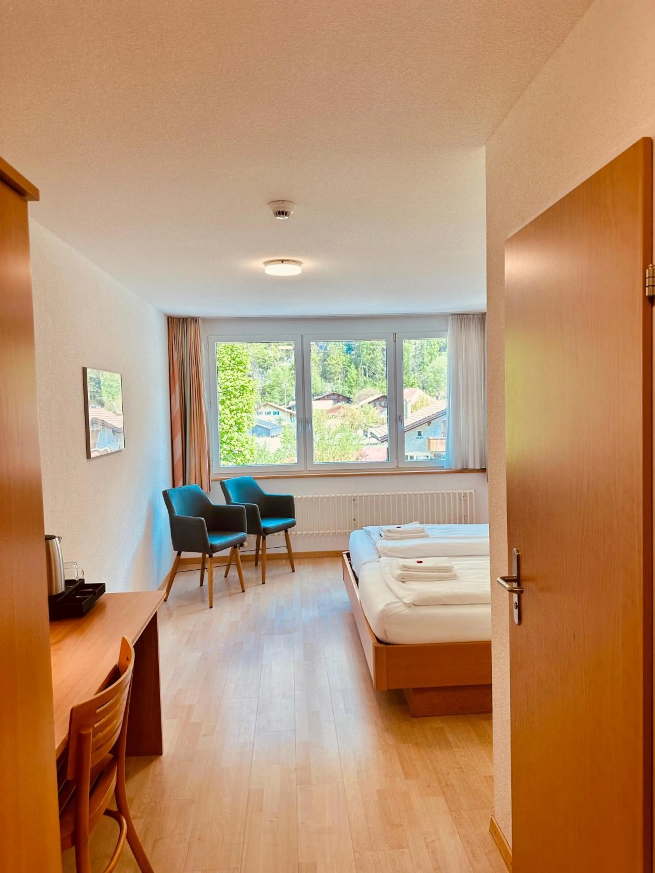 Bed in Hotel Rebstock Meiringen