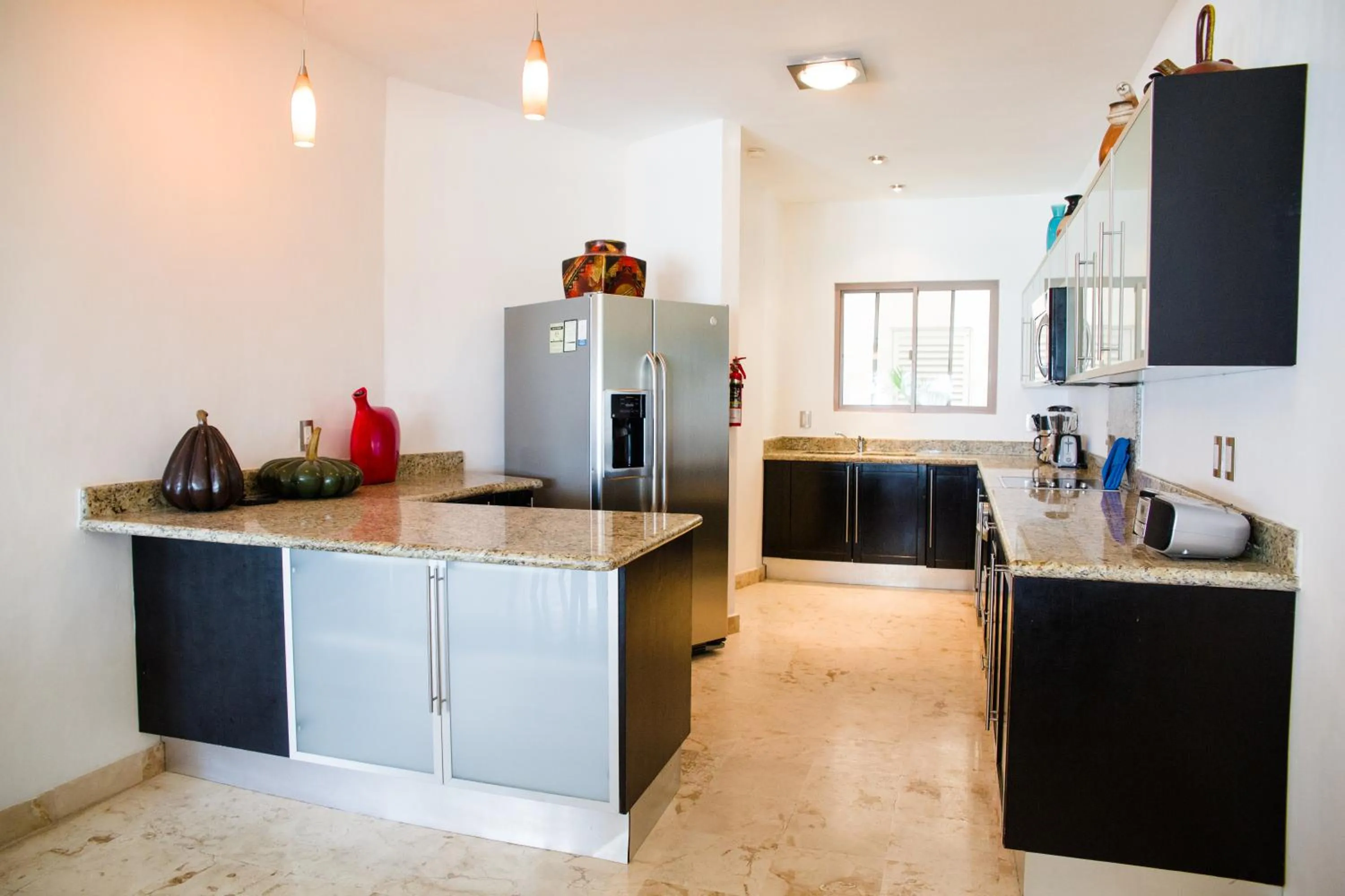 Kitchen or kitchenette in Ocean Front Corto Maltes 104 in Downtown