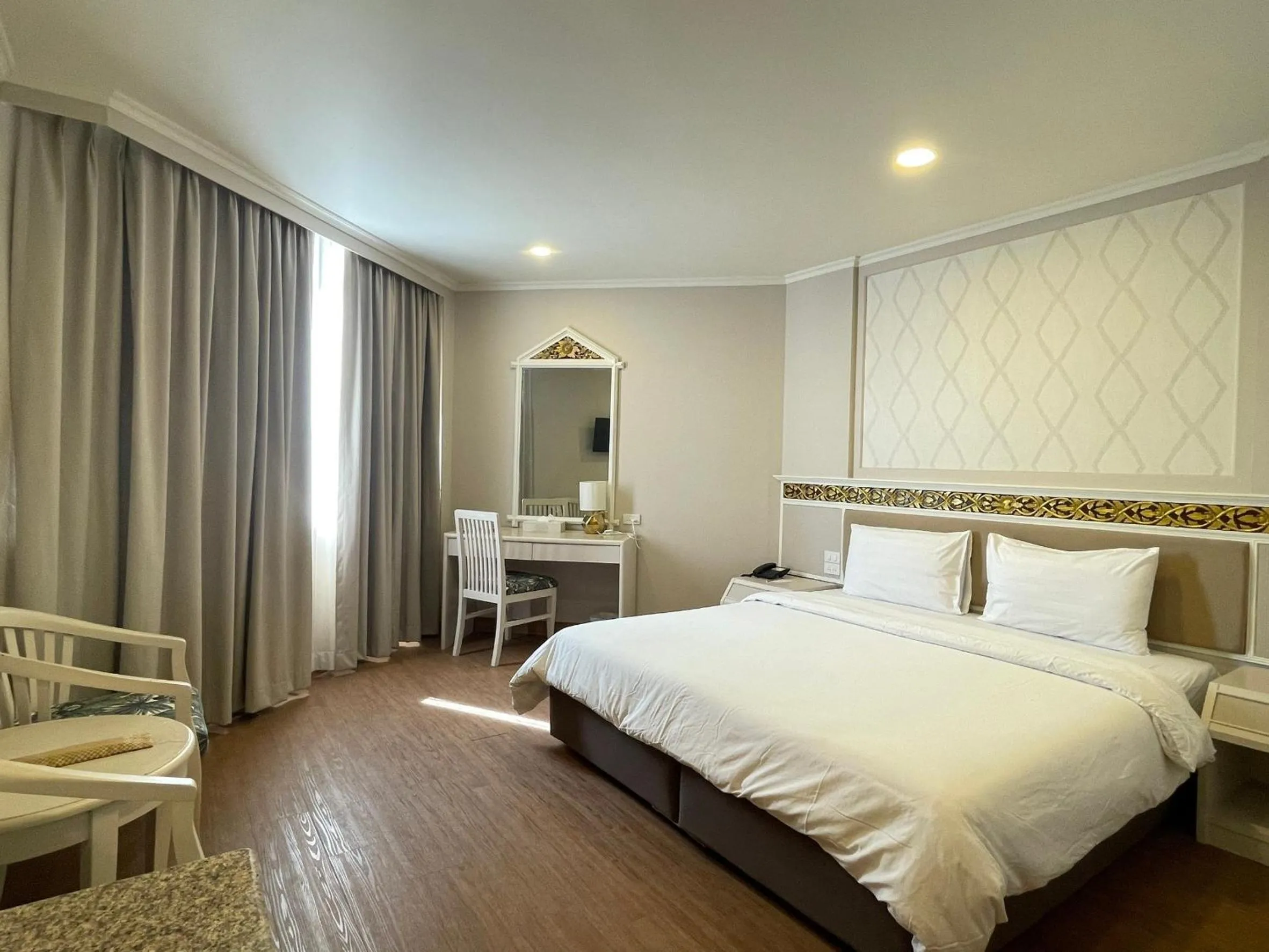 Bed in Wangcome Hotel