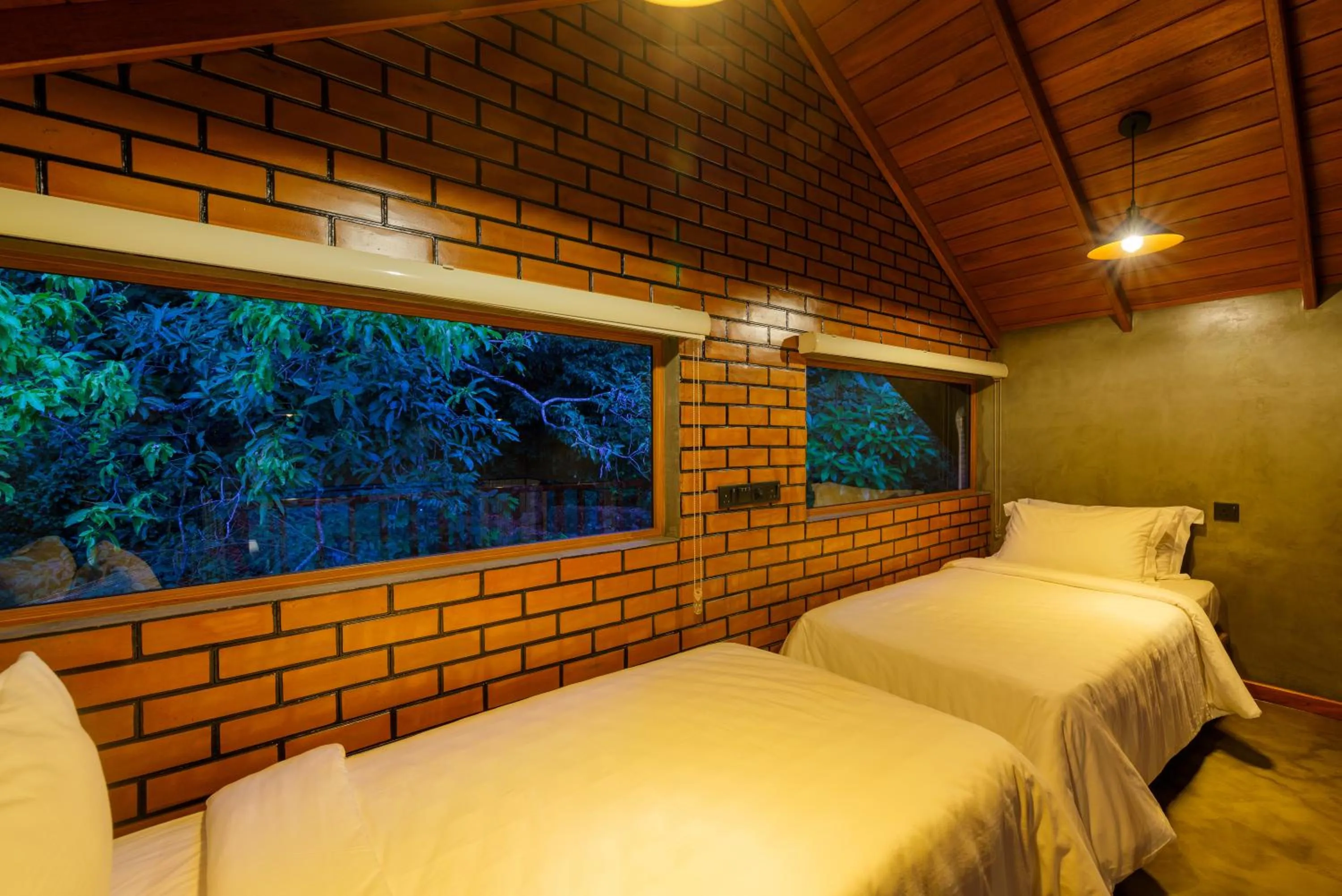 Bed in Villa Rumassala Luxury Chalets Unawatuna