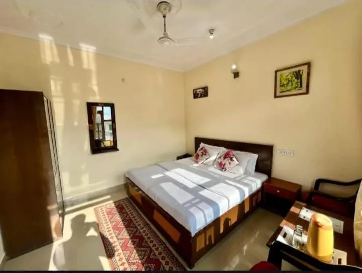 Bedroom in Hotel Anuj Regency