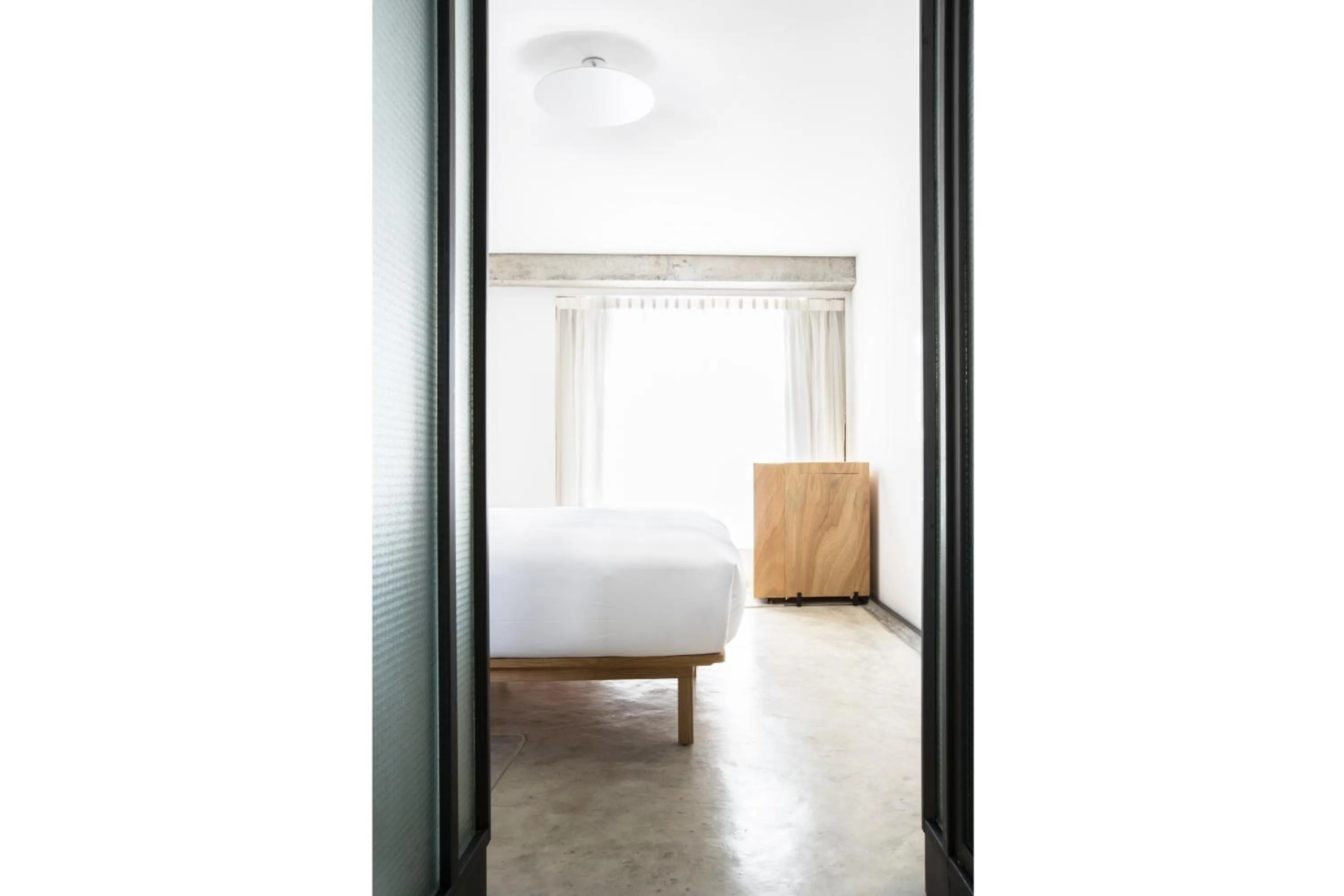 Bedroom in TUVE Hotel