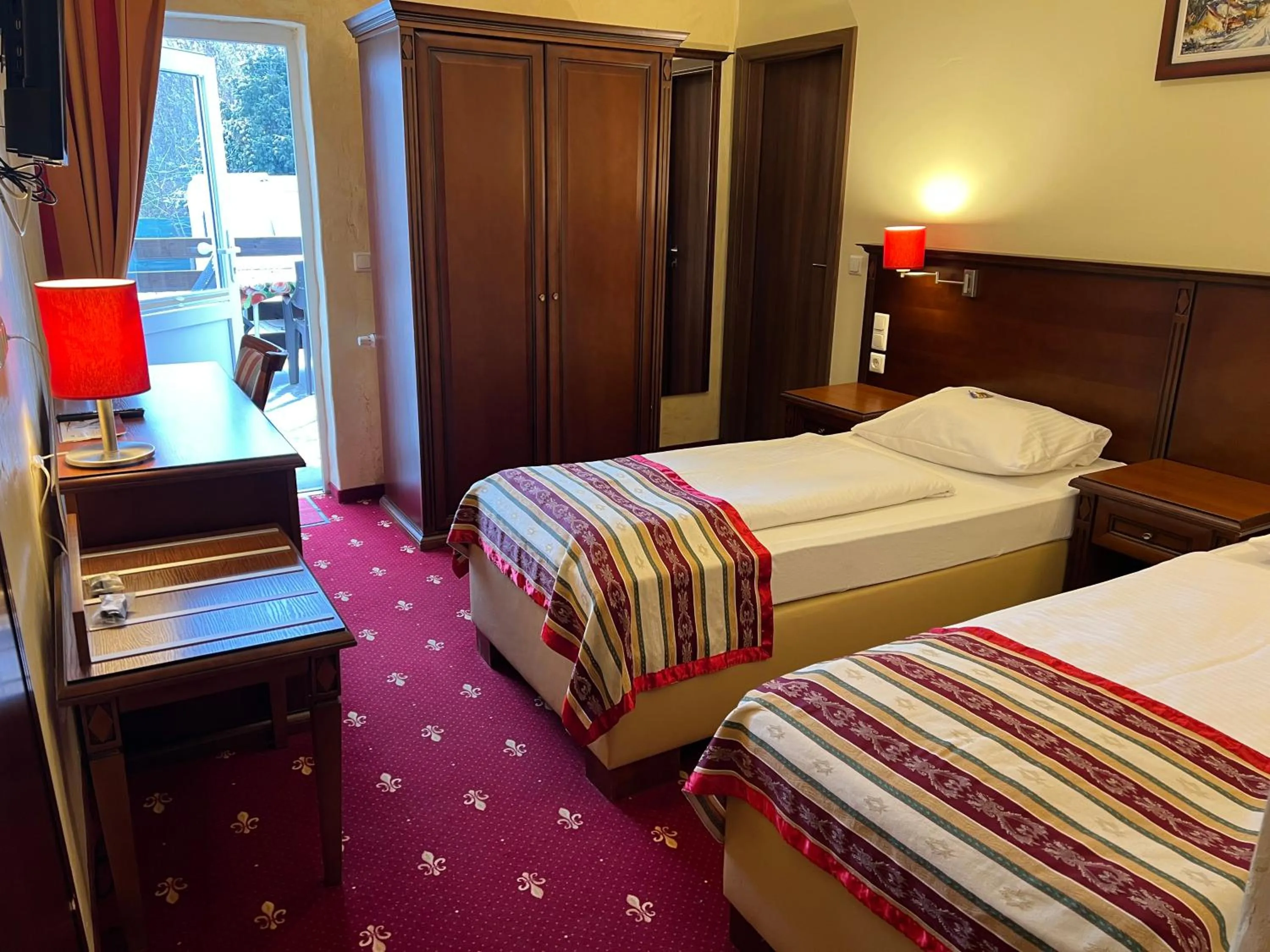 Bed in Hotel Medaillon