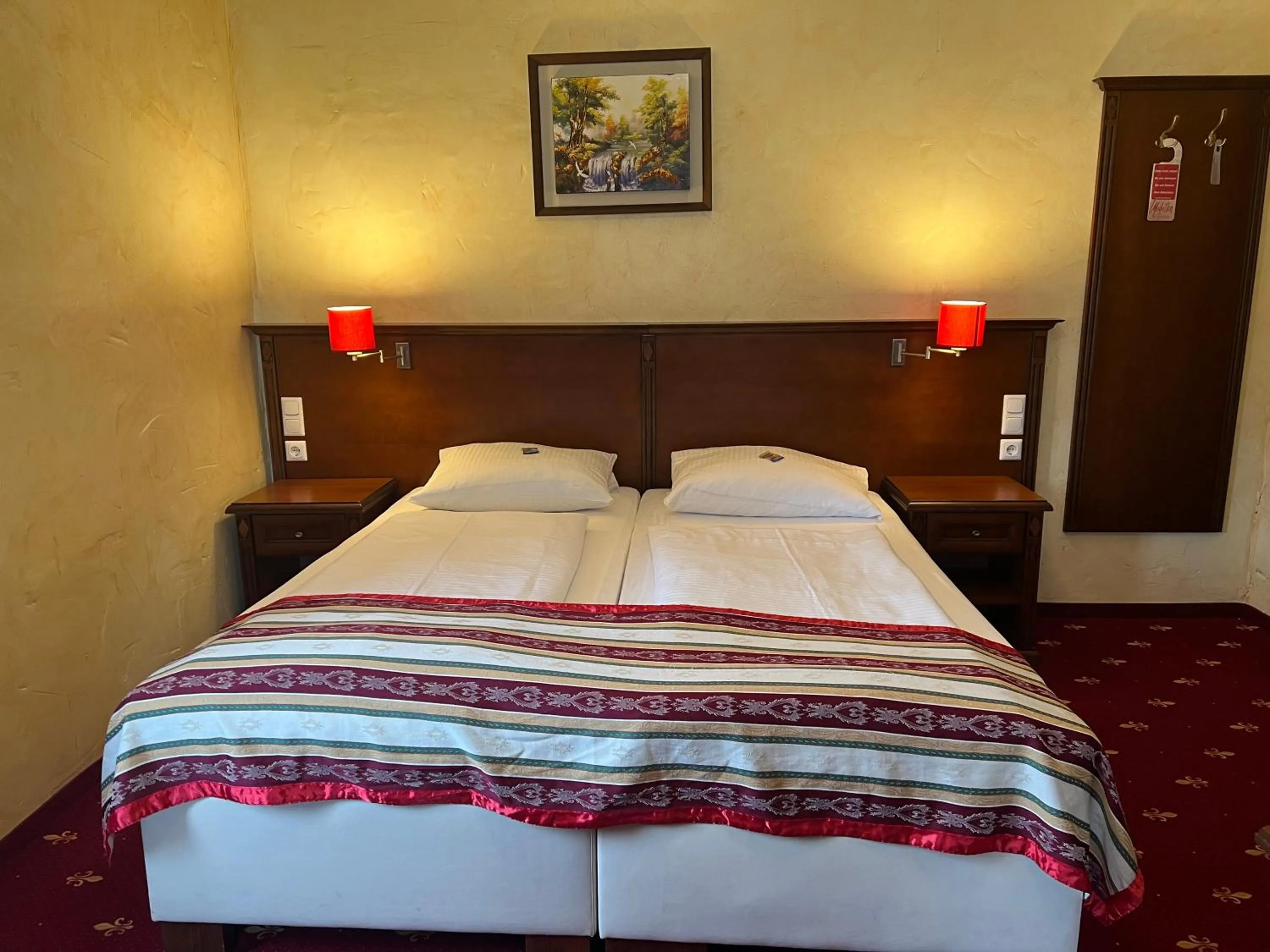 Bed in Hotel Medaillon