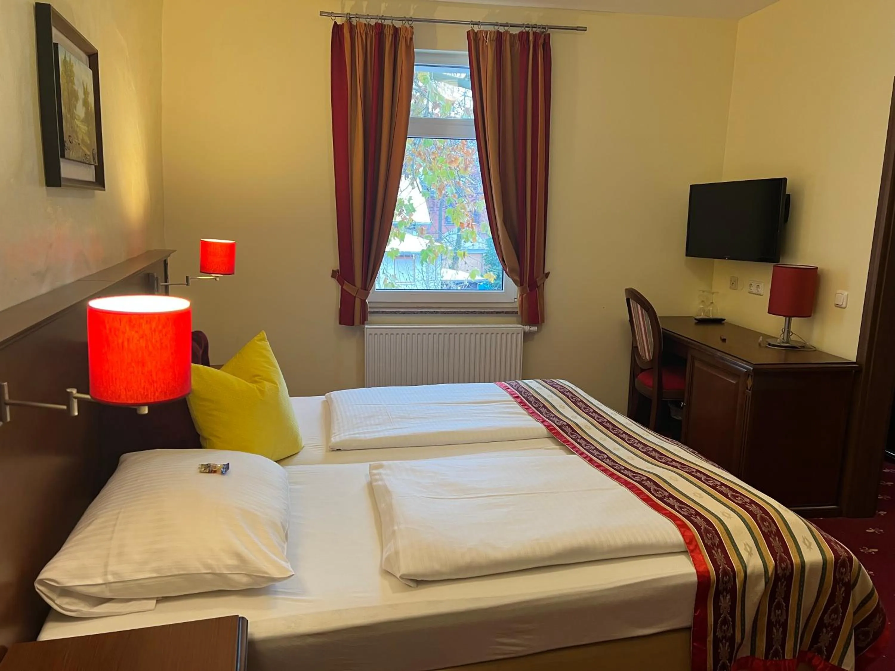 Bed in Hotel Medaillon