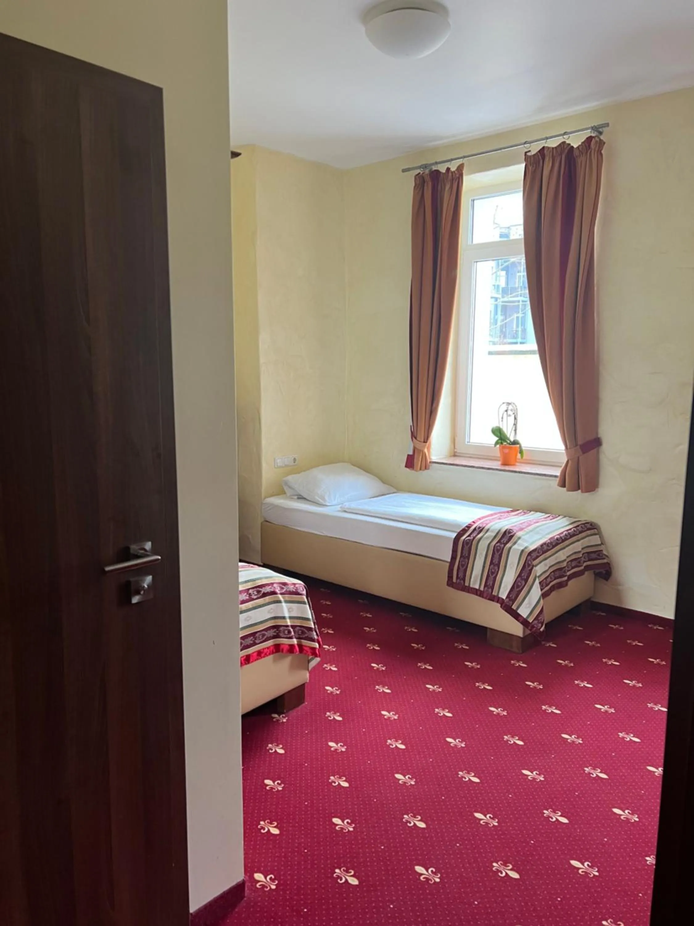 Bed in Hotel Medaillon