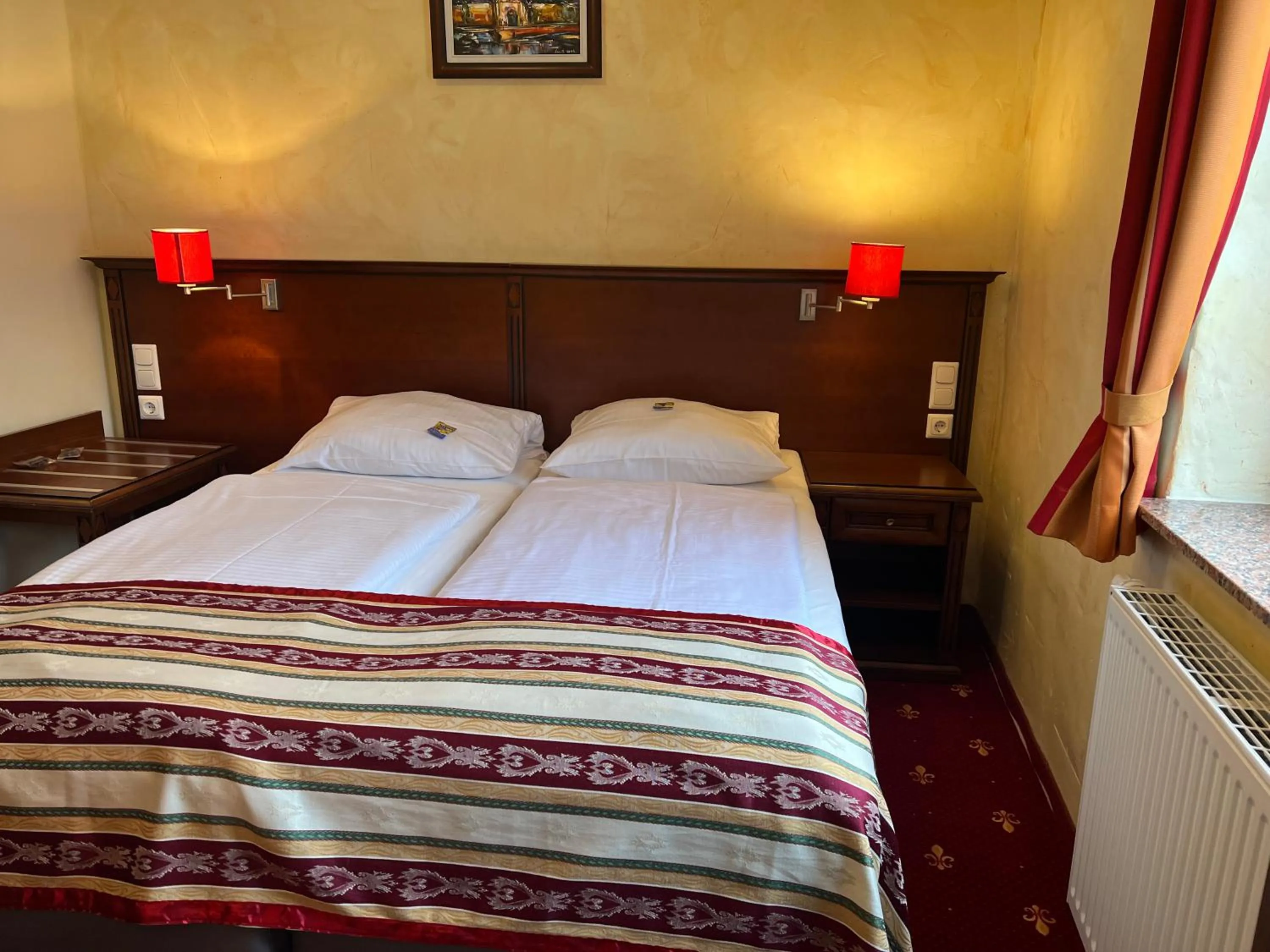 Bed in Hotel Medaillon