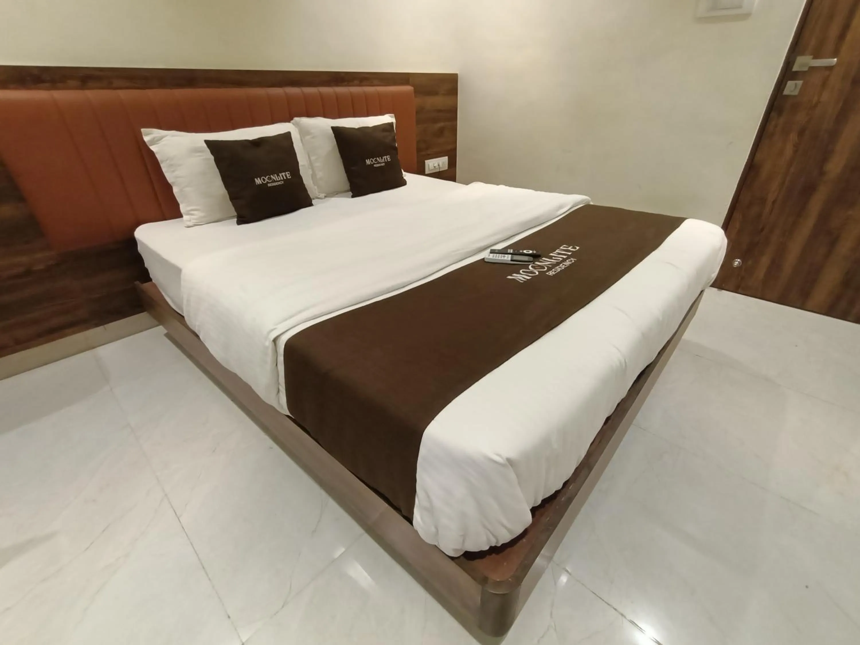 Bed in HOTEL MOON LITE RESIDENCY - Marve Road Malad West