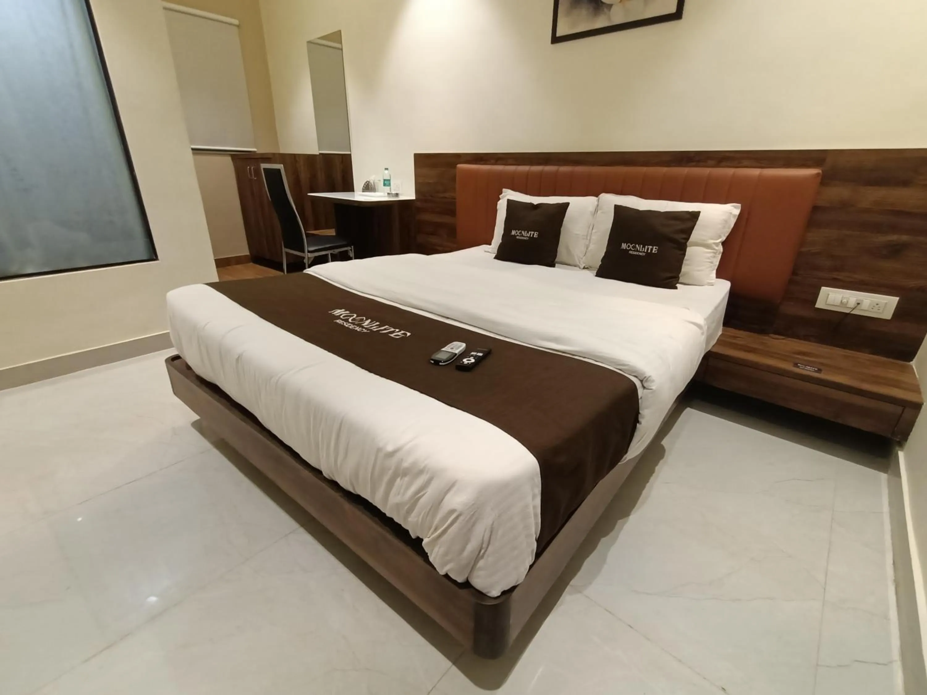 Bed in HOTEL MOON LITE RESIDENCY - Marve Road Malad West