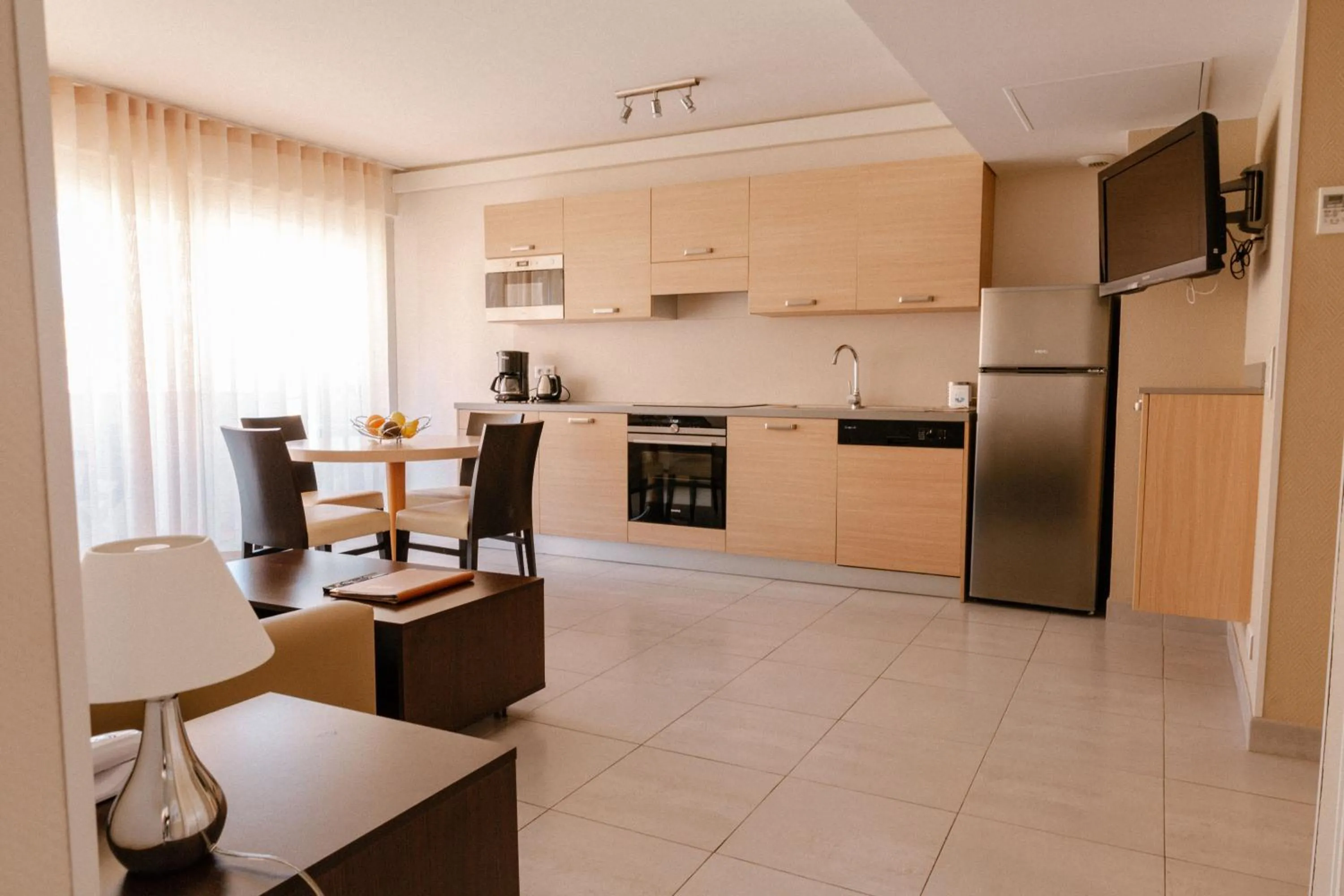 Kitchen or kitchenette in Résidence Châteauneuf