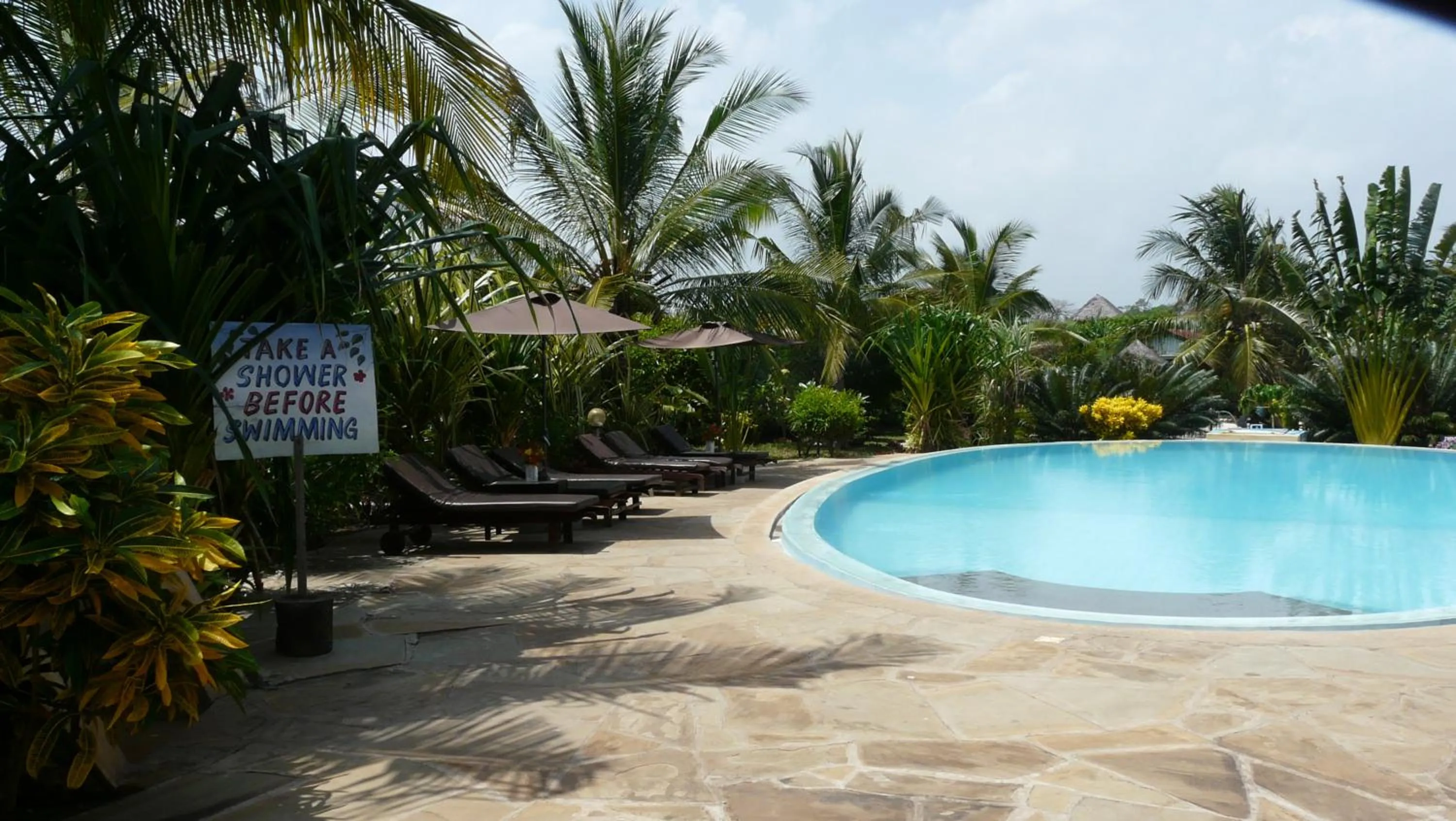 Swimming pool in African Dream Cottages - Diani Beach