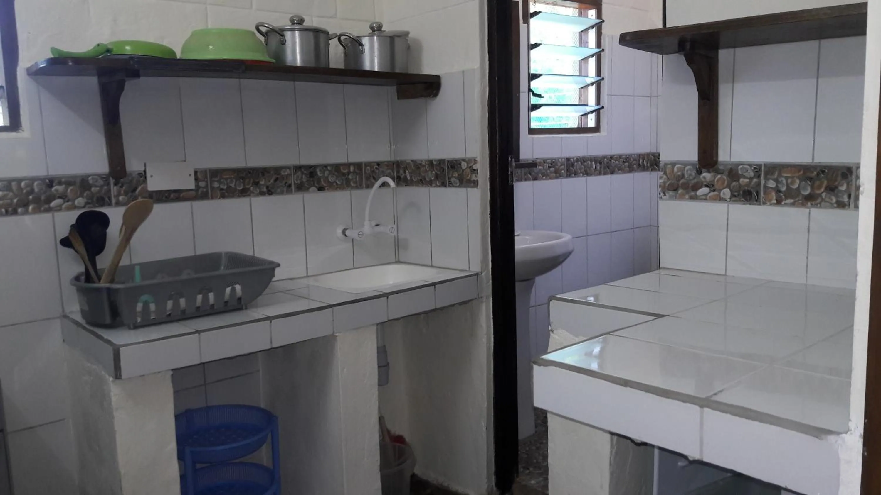 Kitchen or kitchenette in African Dream Cottages - Diani Beach