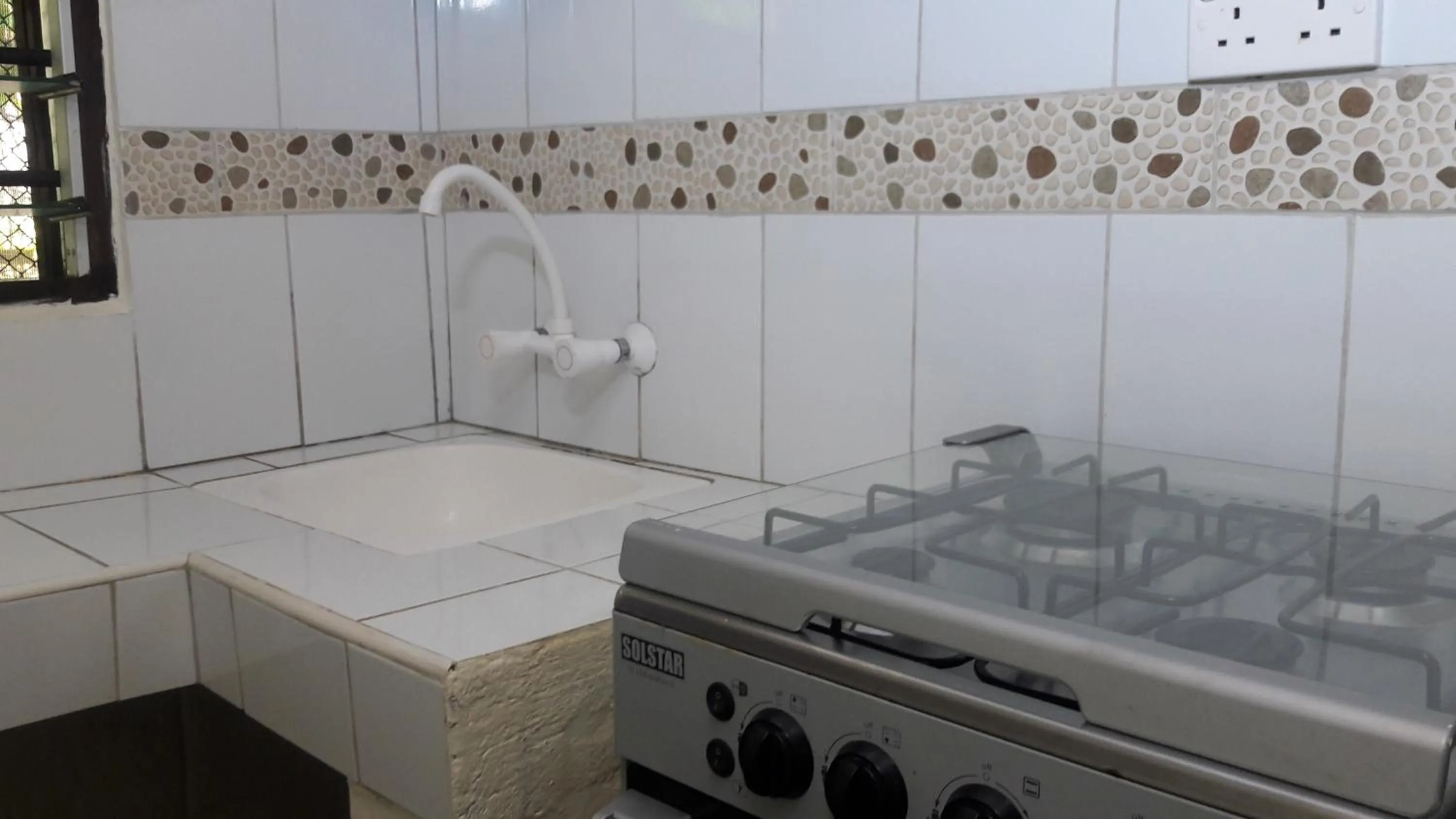 Kitchen or kitchenette in African Dream Cottages - Diani Beach