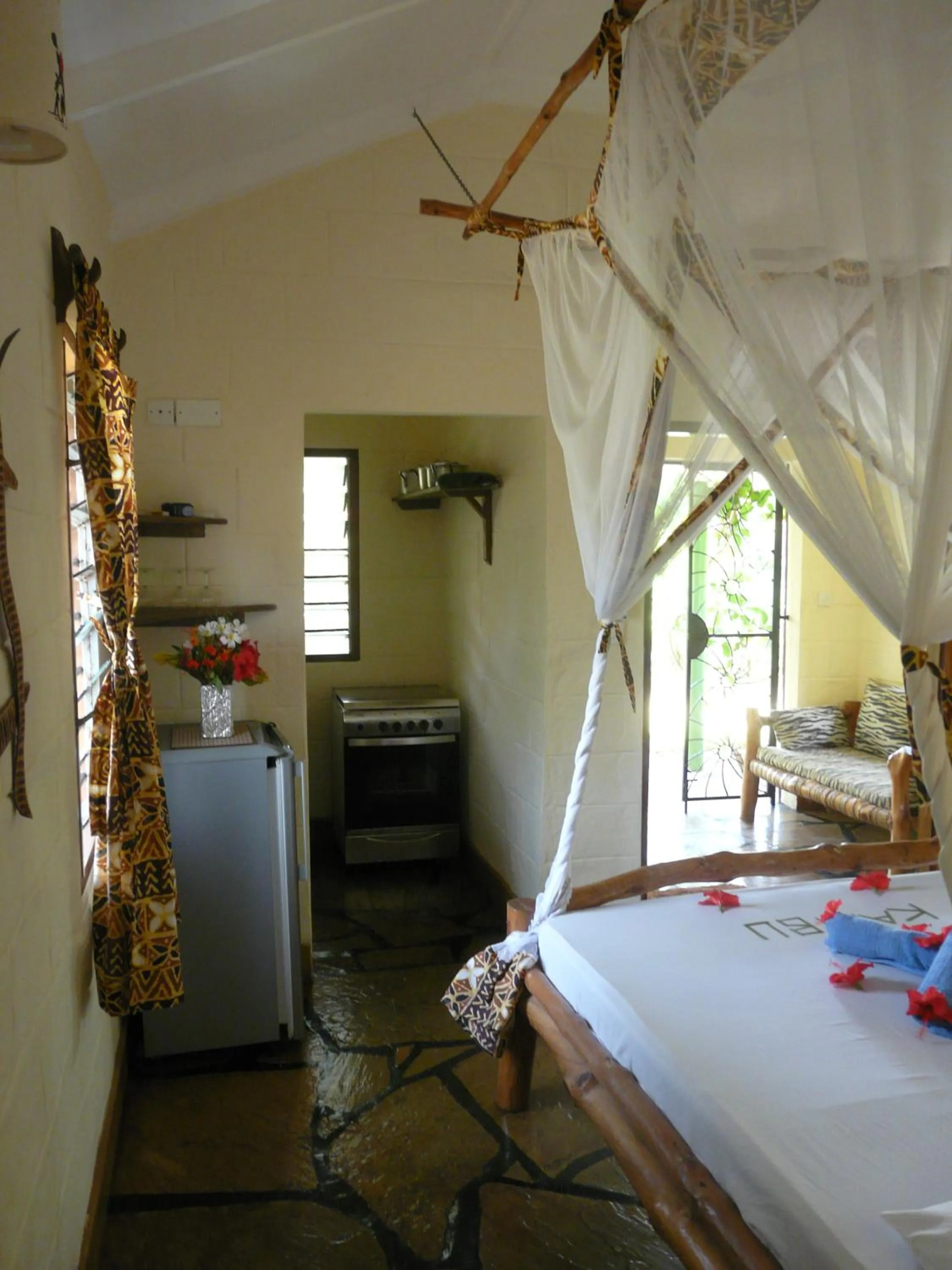 Photo of the whole room, Bed in African Dream Cottages - Diani Beach