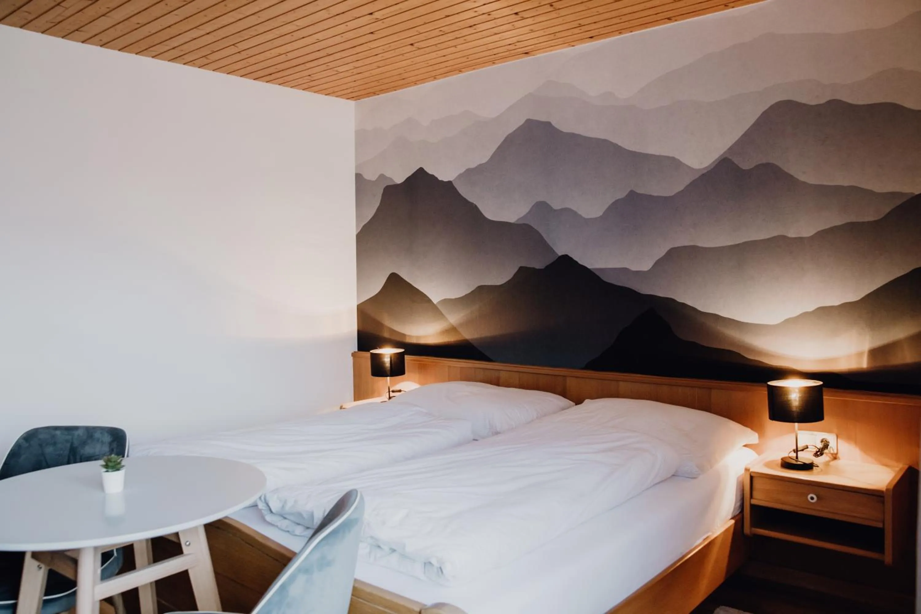 Bedroom, Bed in Dorfcafe Unken Hotelpension sWirtshaus im Dorf