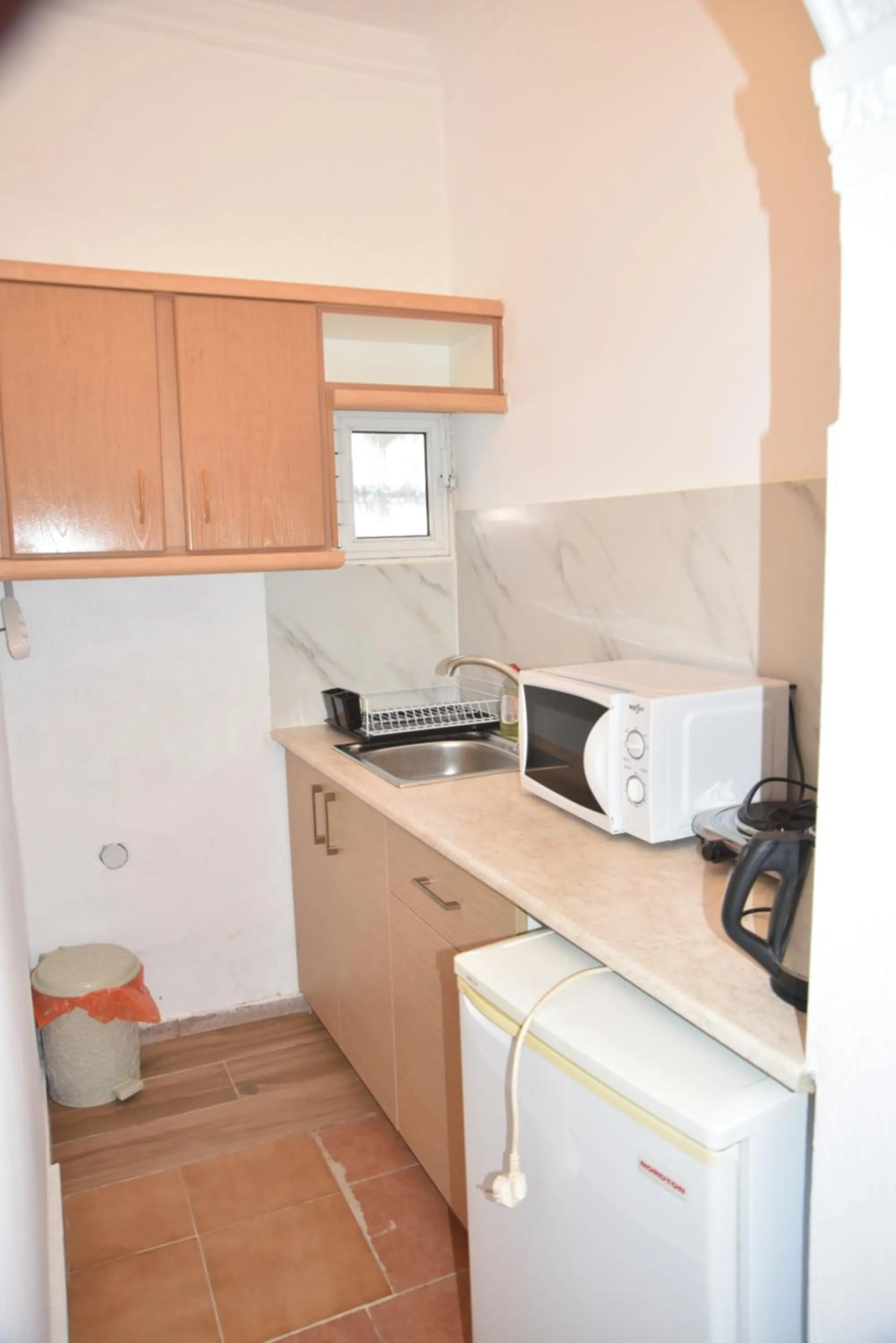 Kitchen or kitchenette in Jimmy's Apartments