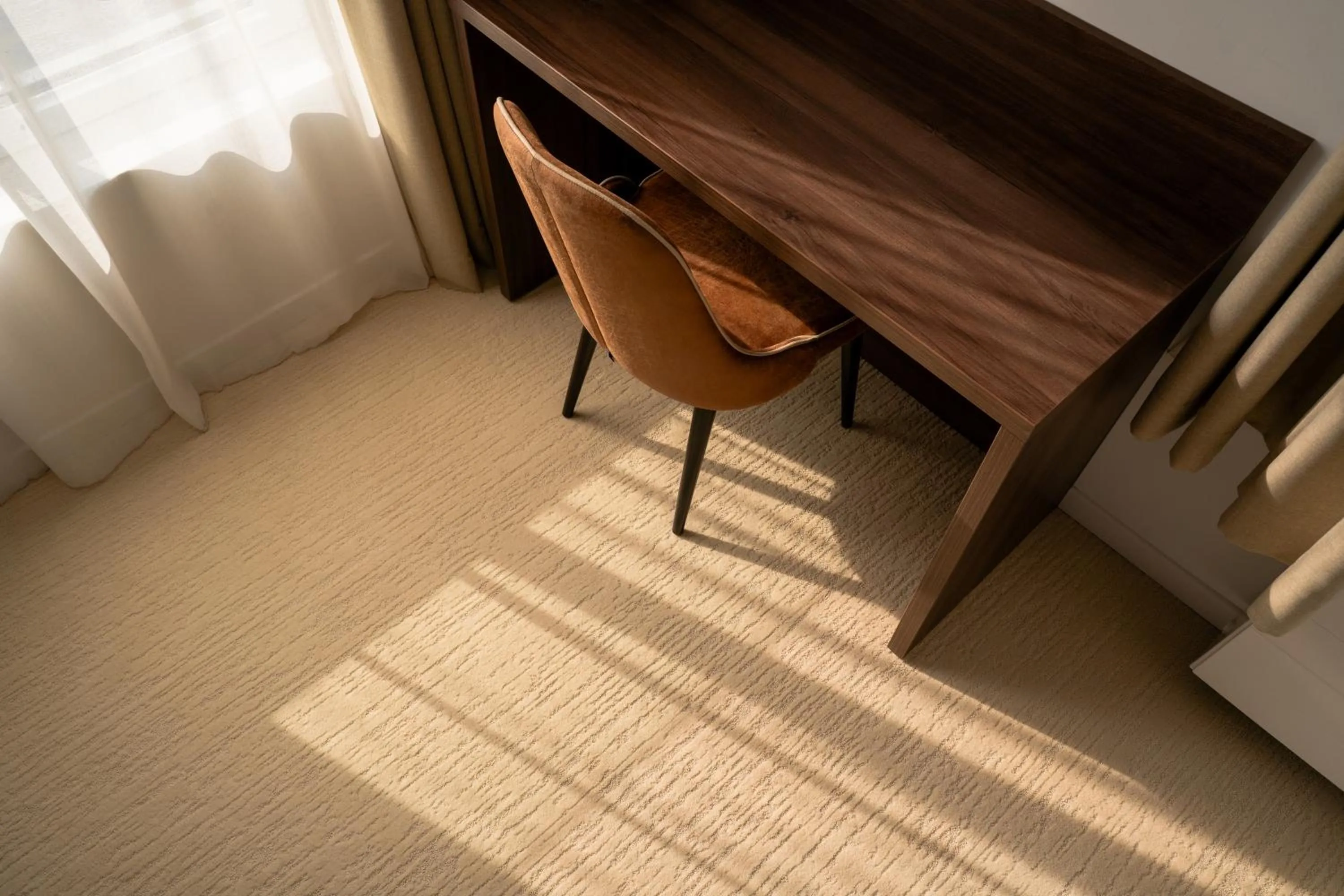 Seating area in Hôtel Le Manoir du Roselier