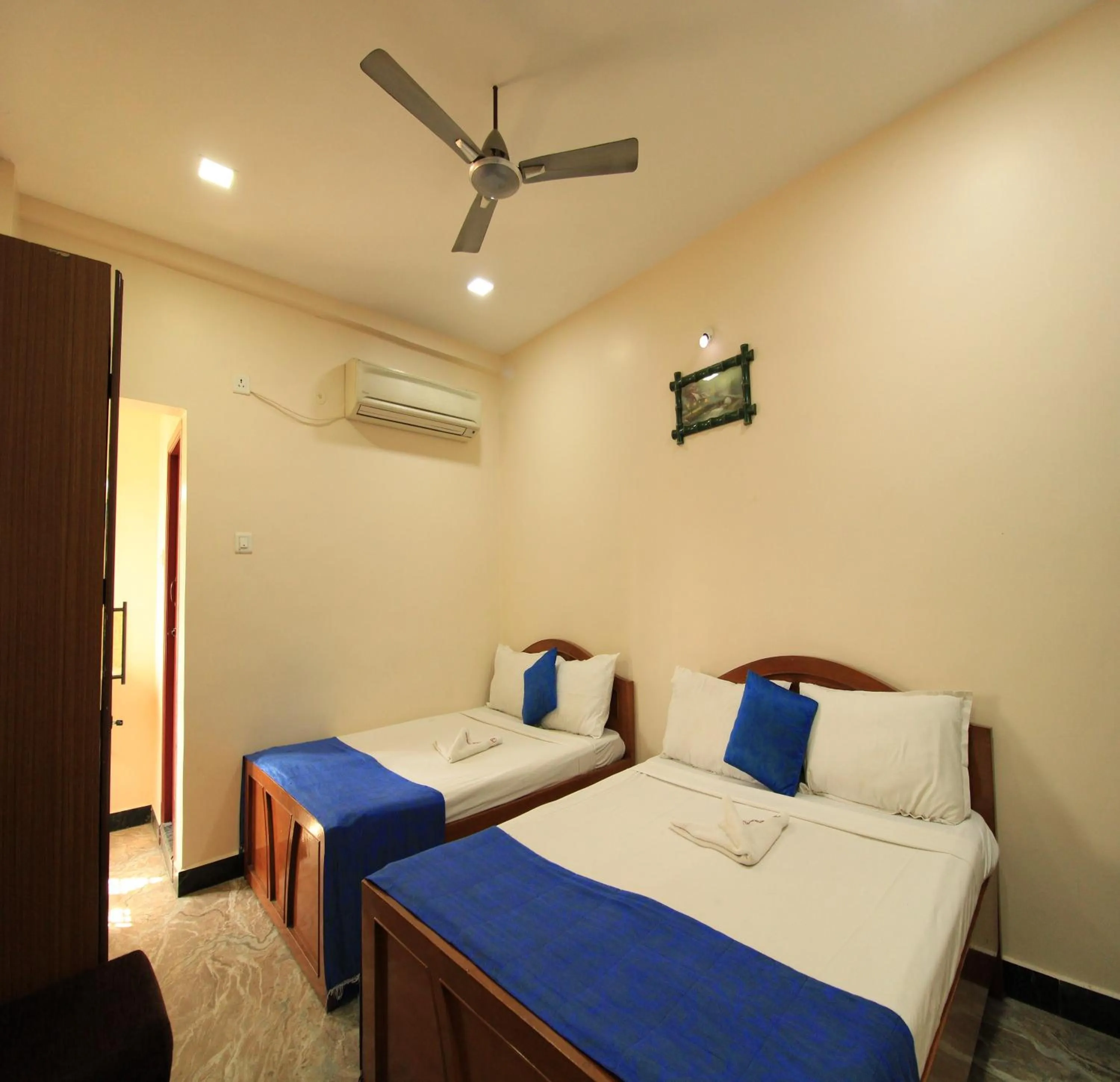 Bed in Hotel Rathnavel Towers