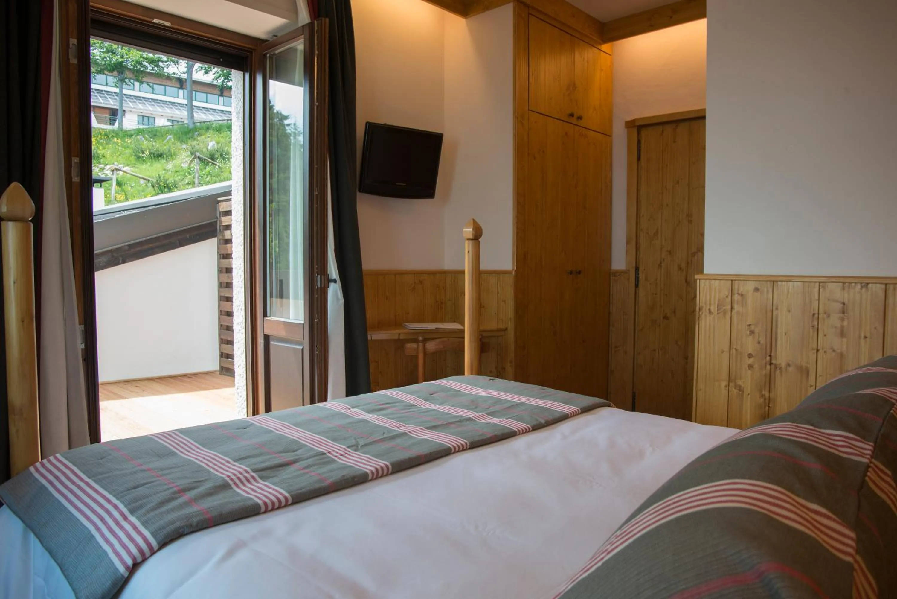 Bedroom, Bed in Albergo Ristorante Bucaneve