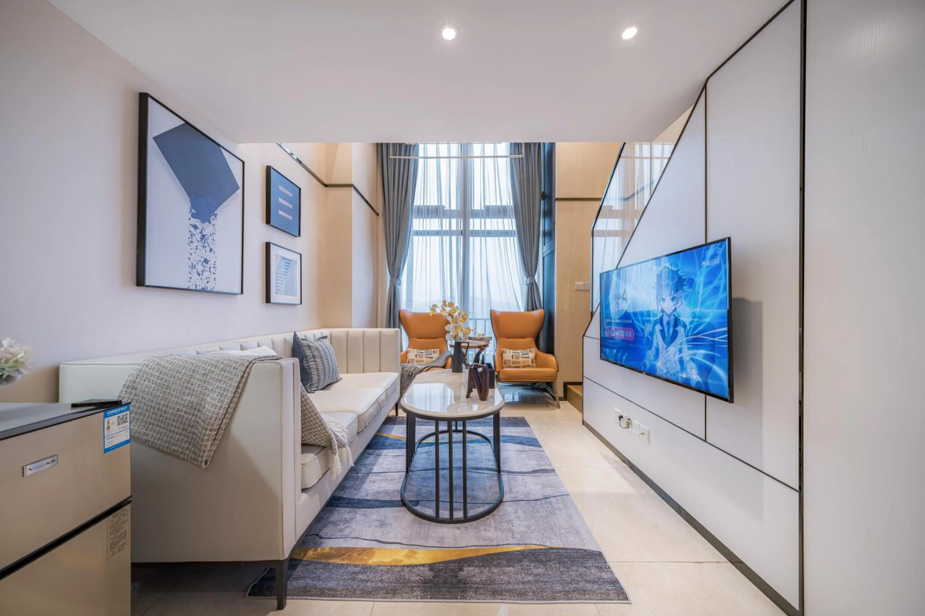 TV and multimedia in Gepai Executive Apartment - Shenzhen Futian Convention and Exhibition Center
