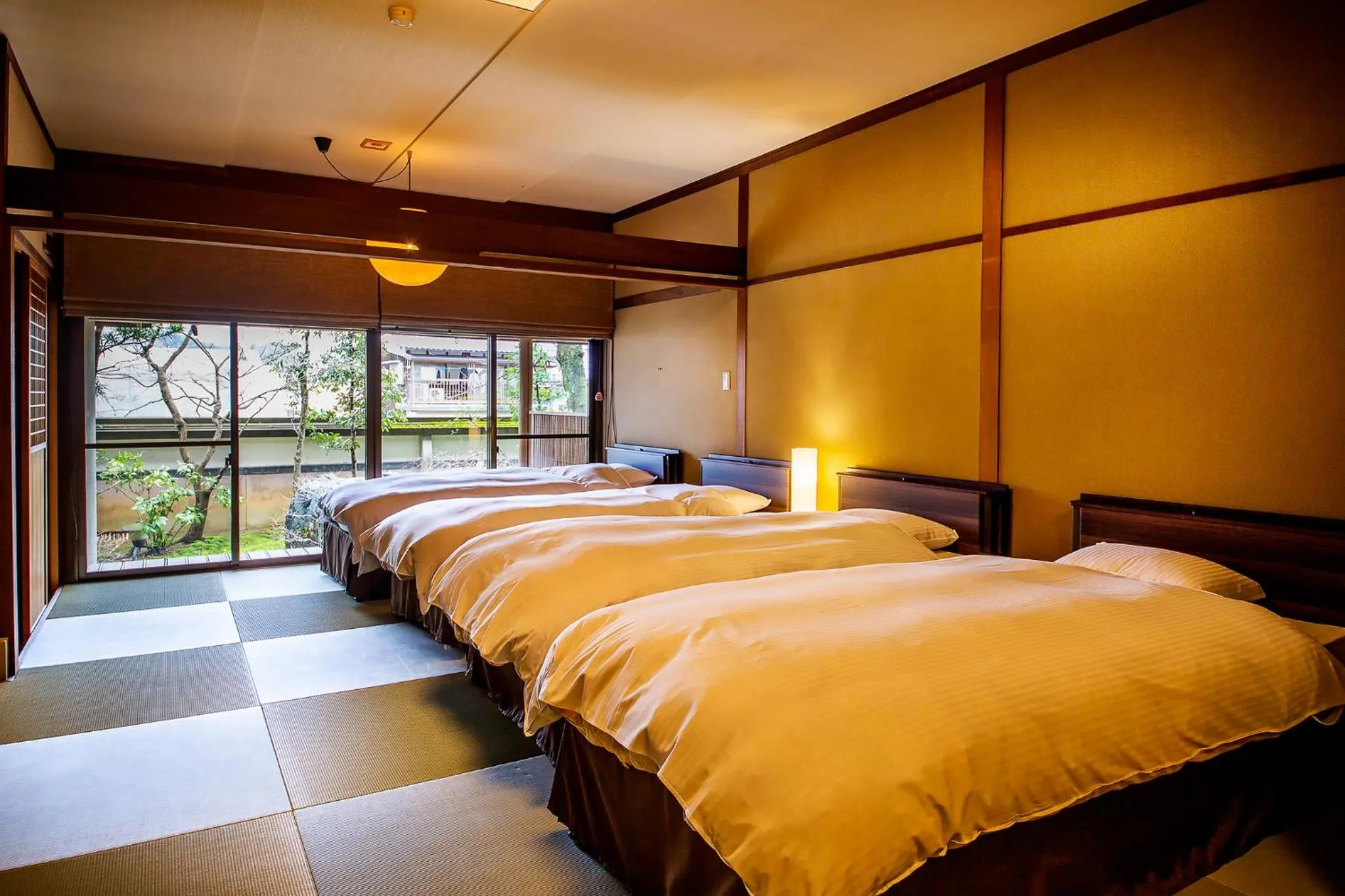 Bed in Ryoutei Ryokan Yasui