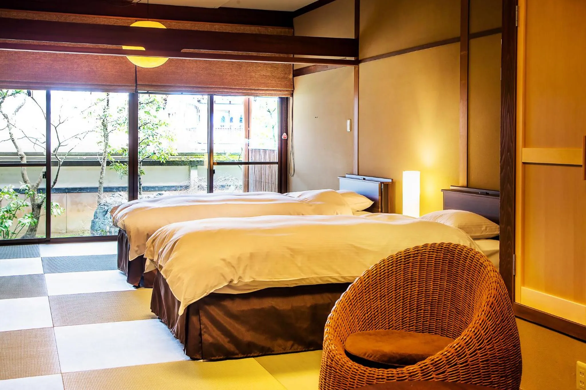 Bed in Ryoutei Ryokan Yasui