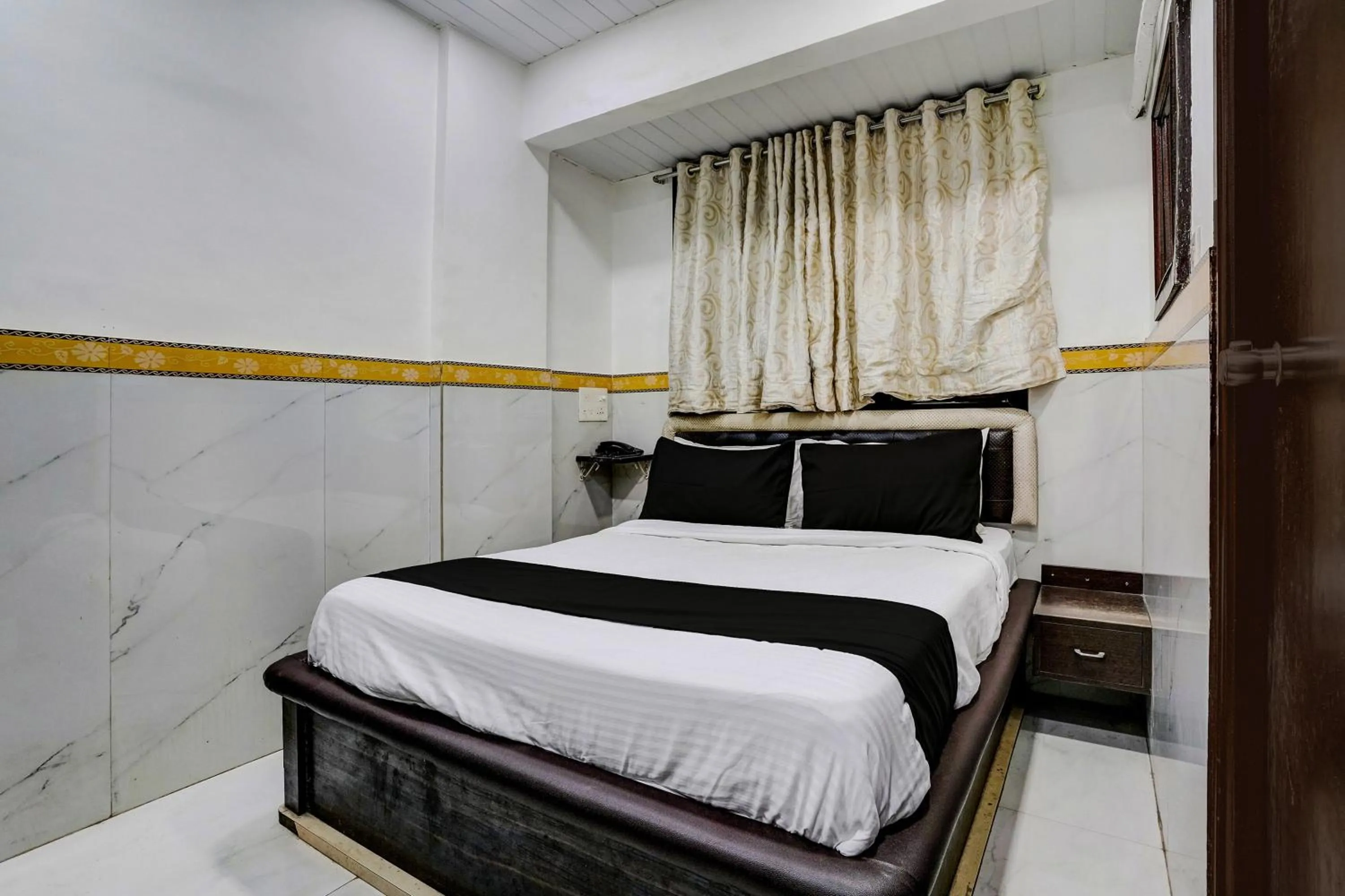 Bedroom, Bed in Hotel O Shree Sai Residency
