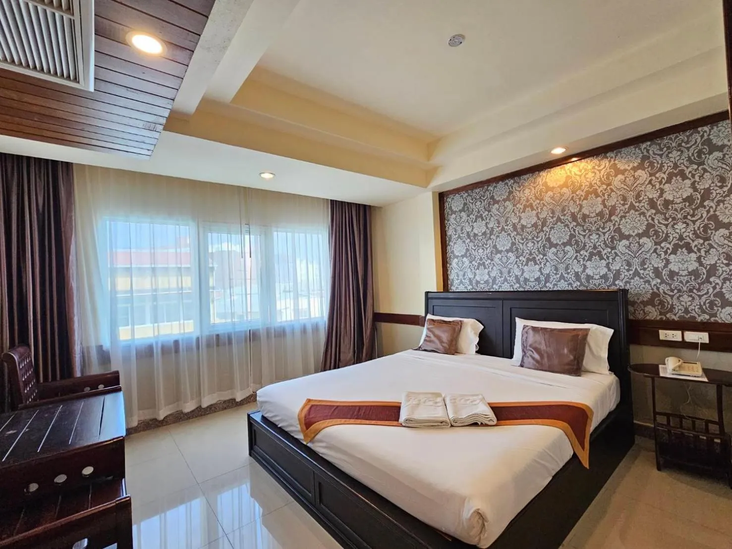 Bed in Boutique Bravo Hotel