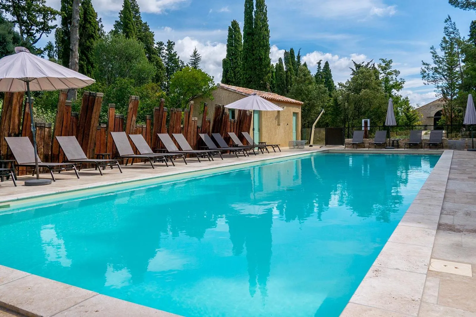 Swimming pool in Les Cabanes Dans Les Bois Logis Hôtel