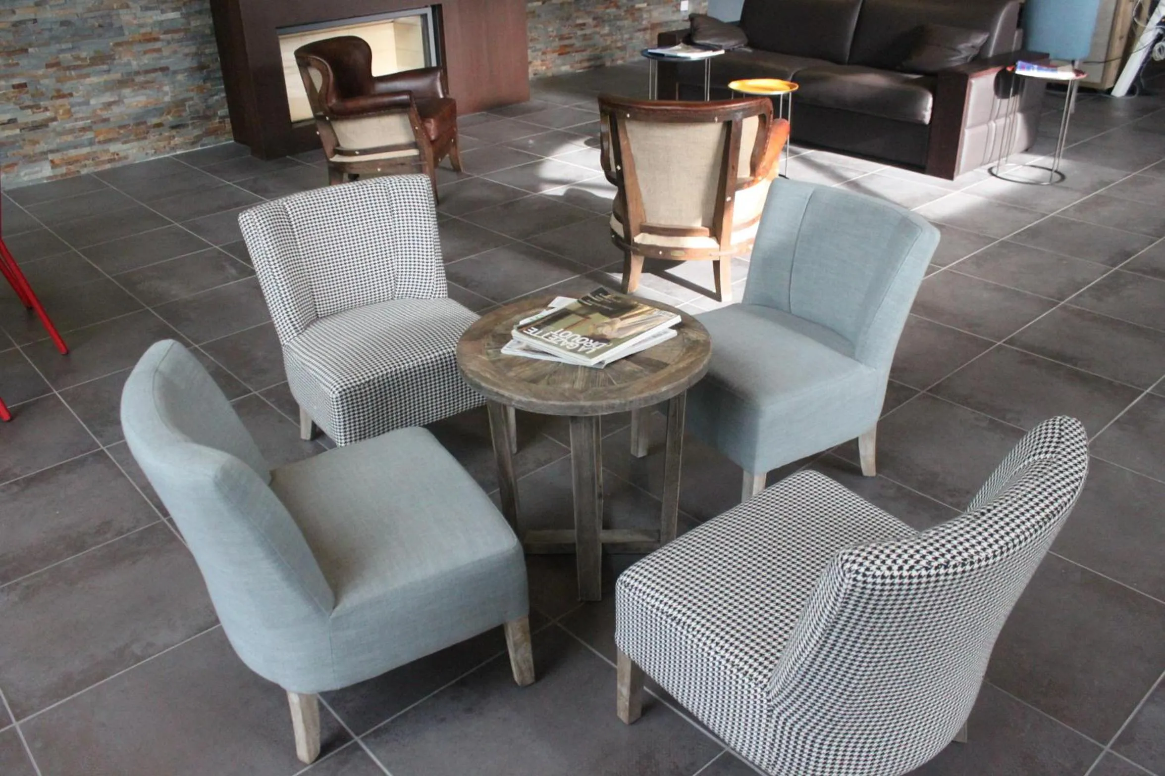 Lobby or reception in Les Cabanes Dans Les Bois Logis Hôtel