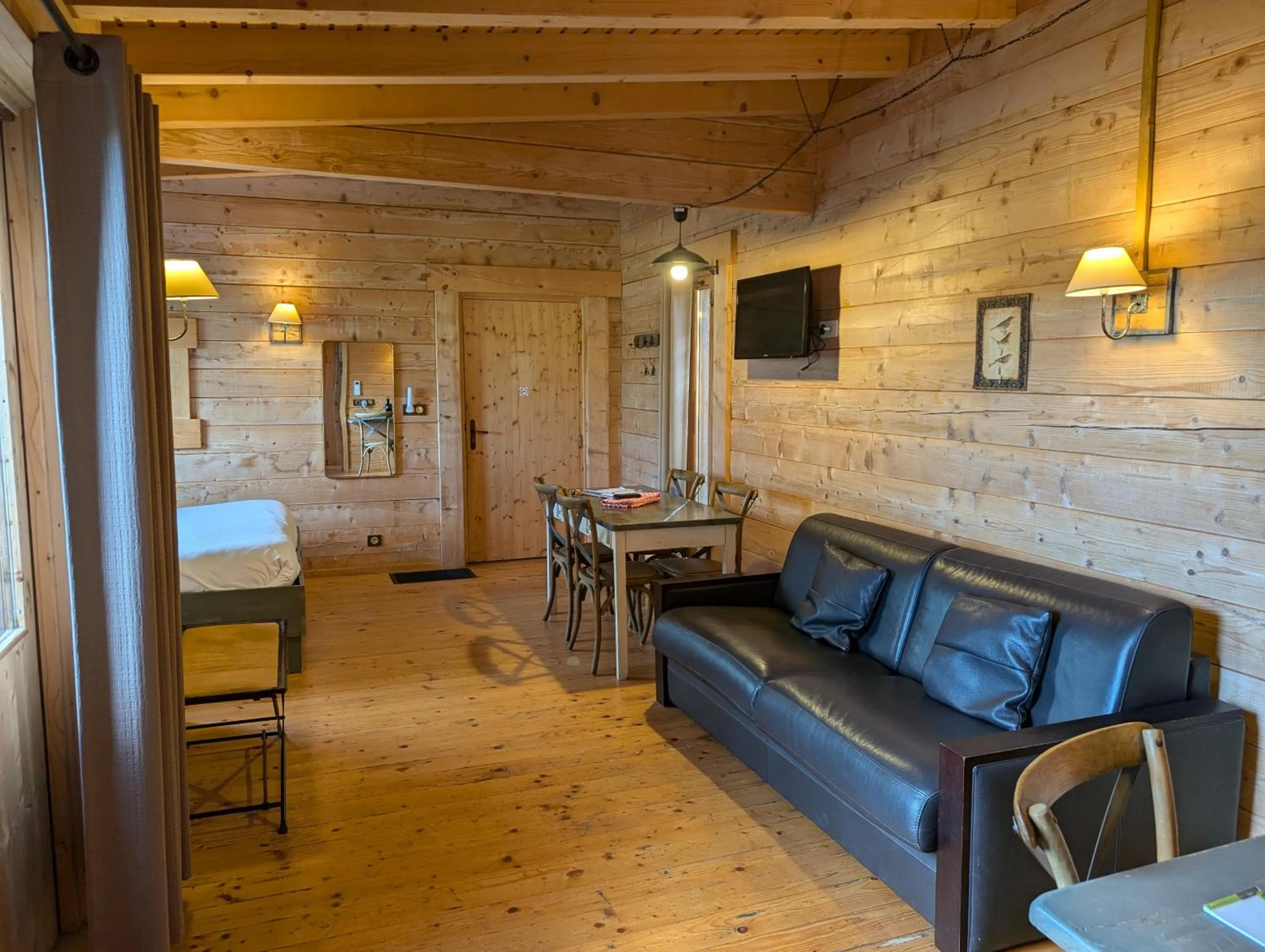 Seating area in Les Cabanes Dans Les Bois Logis Hôtel
