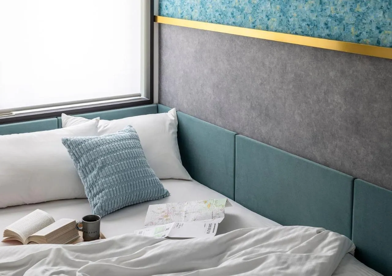 Bed in HOTEL GRAPHY Shibuya