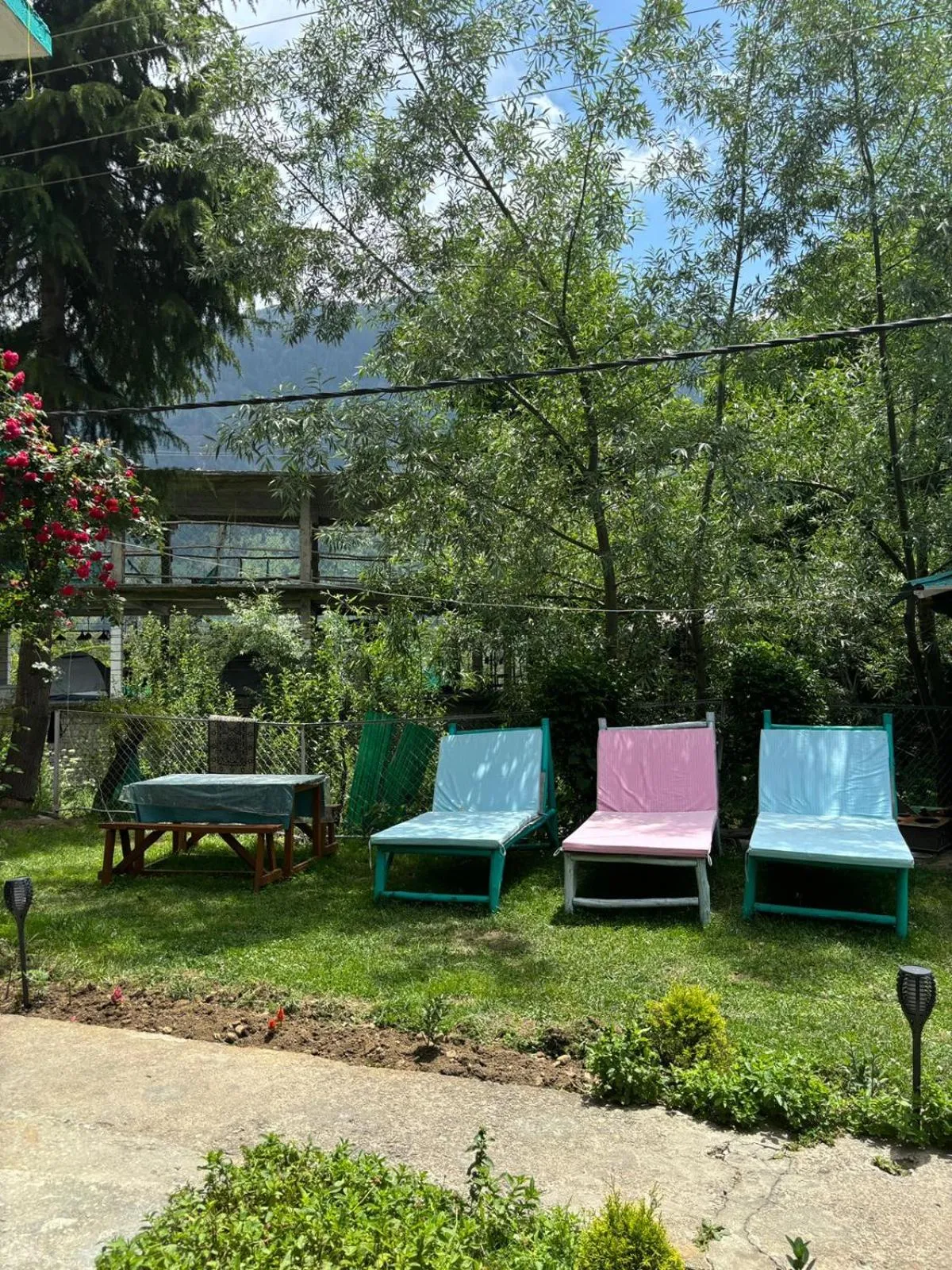 Seating area in Beholden Stay And Cafe - A Luxury Boutique Hotel In Manali